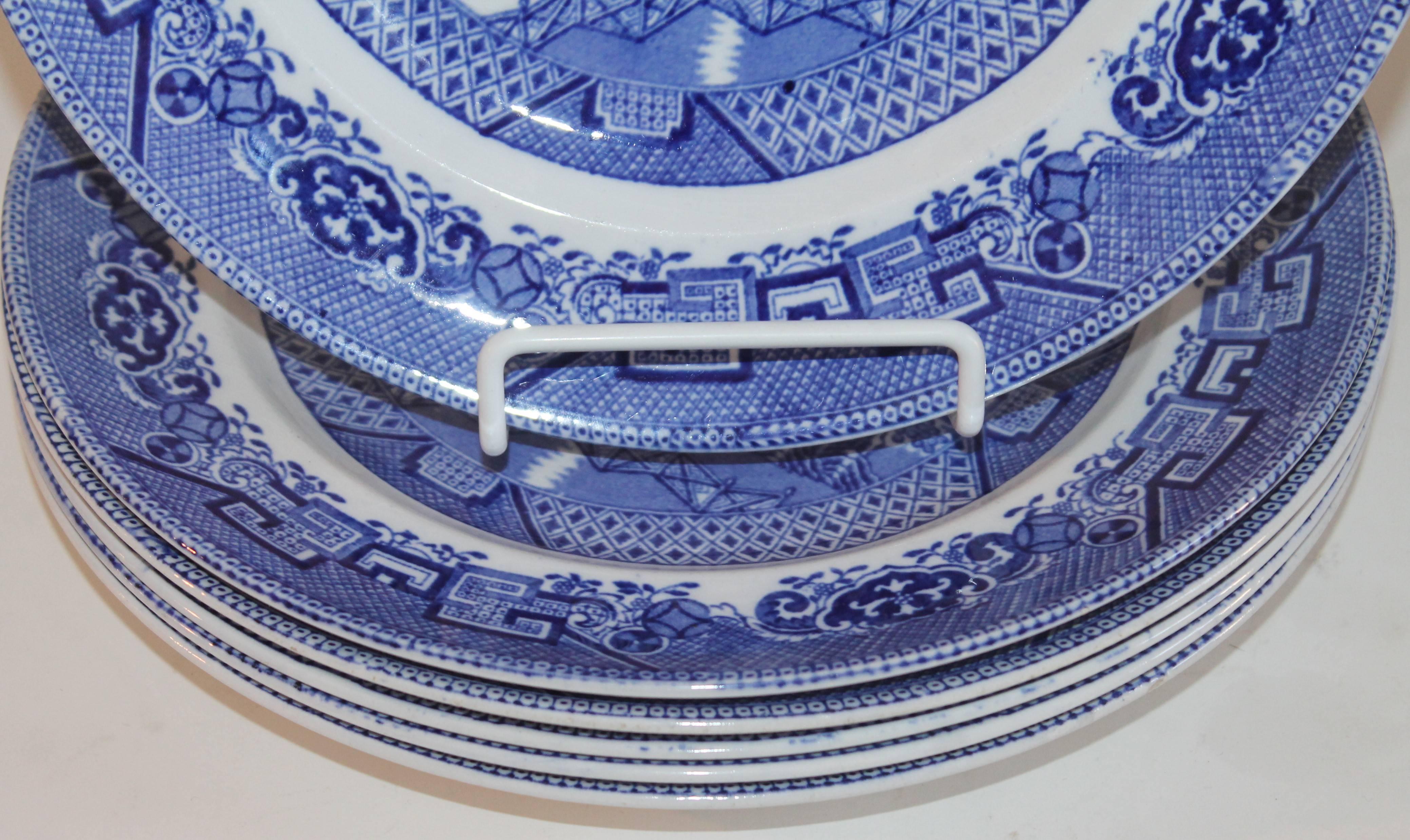 Serve ware made to last 19th century blue willow with the typical blue willow pattern. This set is stamped 
