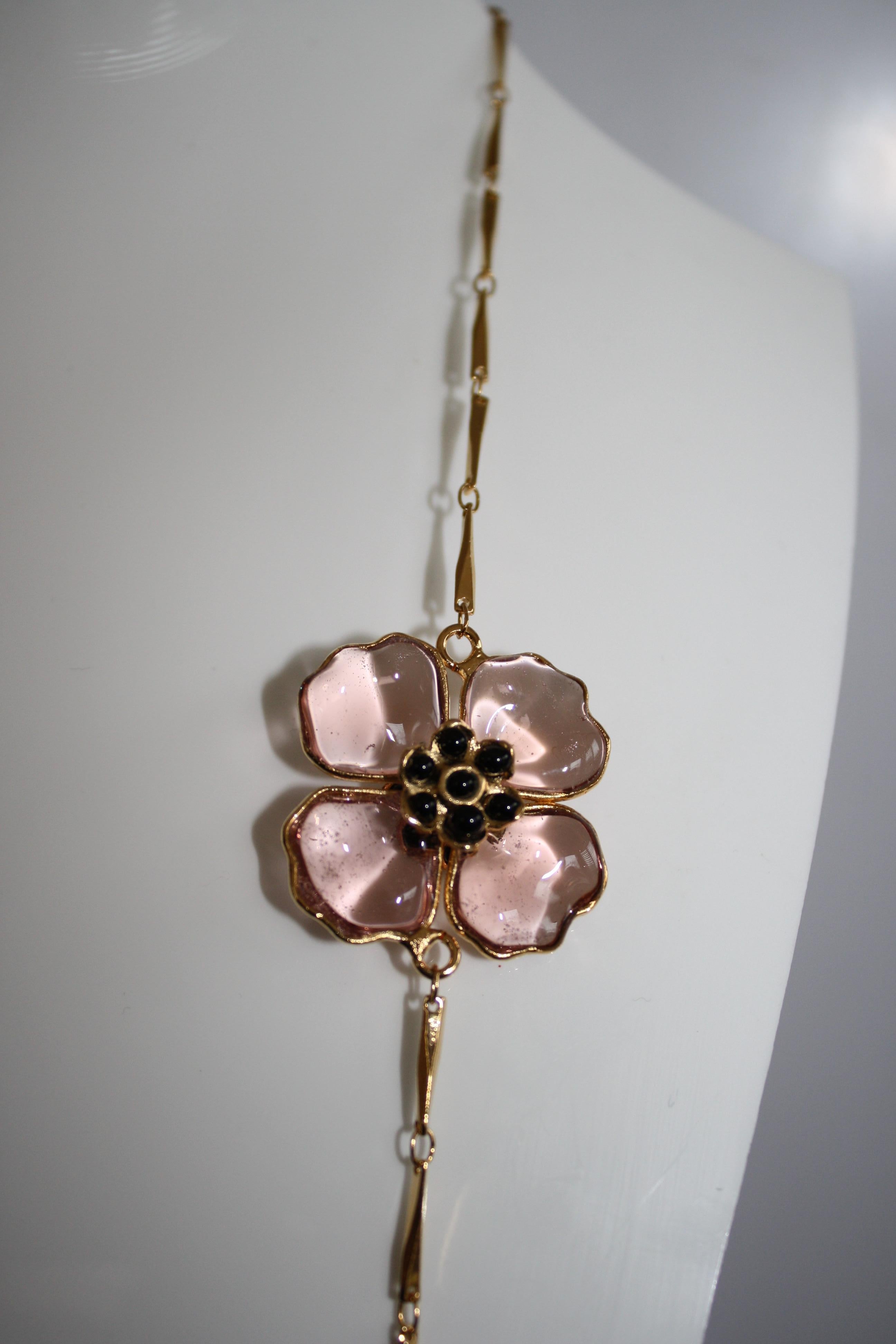 Hand molded pate de verre glass flower necklace on gold chain from Gripoix Paris. 