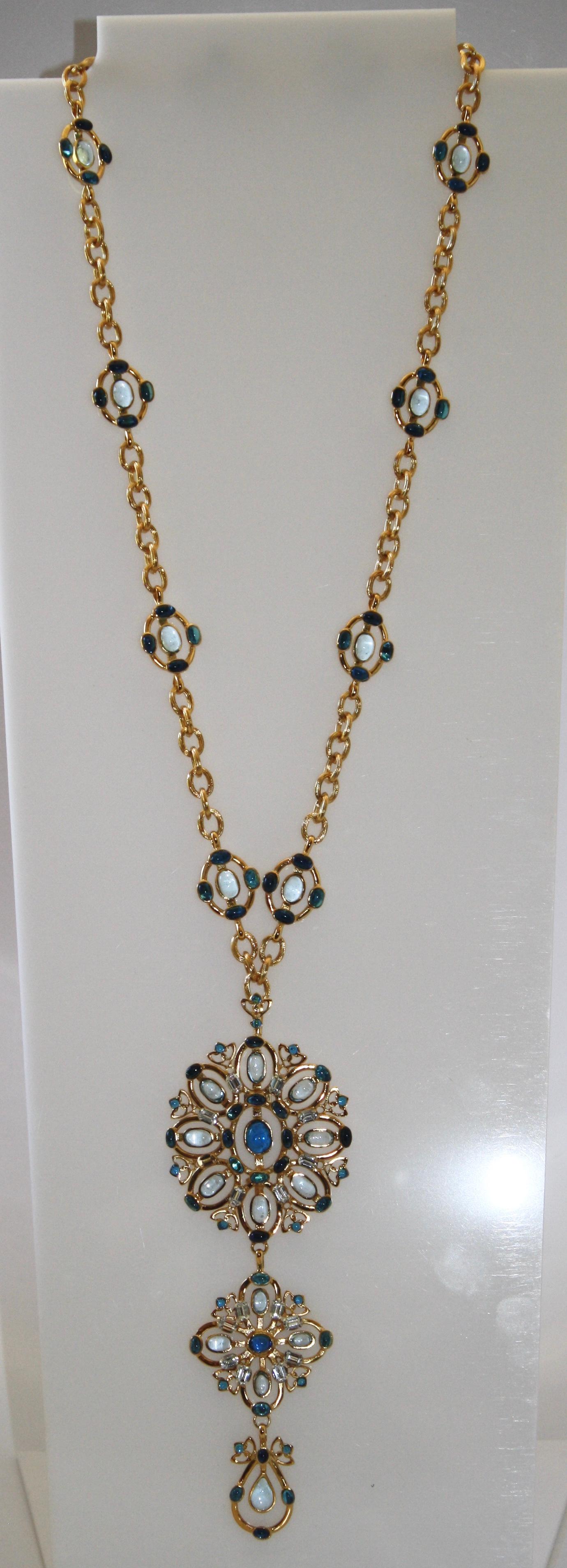 Multi shades of blue poured glass pendant necklace made with 24k gold plated chain. 

Chain is 75cm and pendant is 14.5cm
