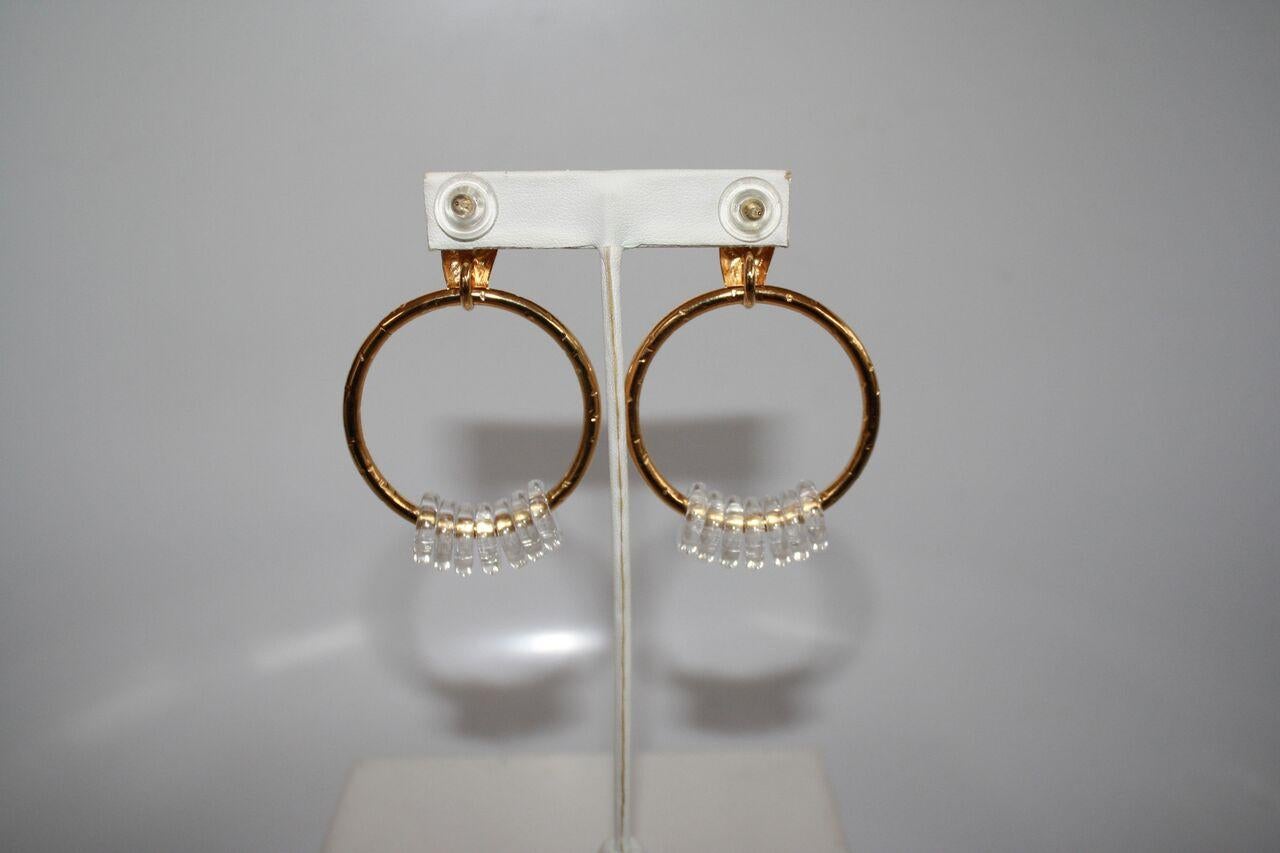 Hand carved snake head top earrings with gold ring and clear poured glass rounds from Gripoix Paris. 