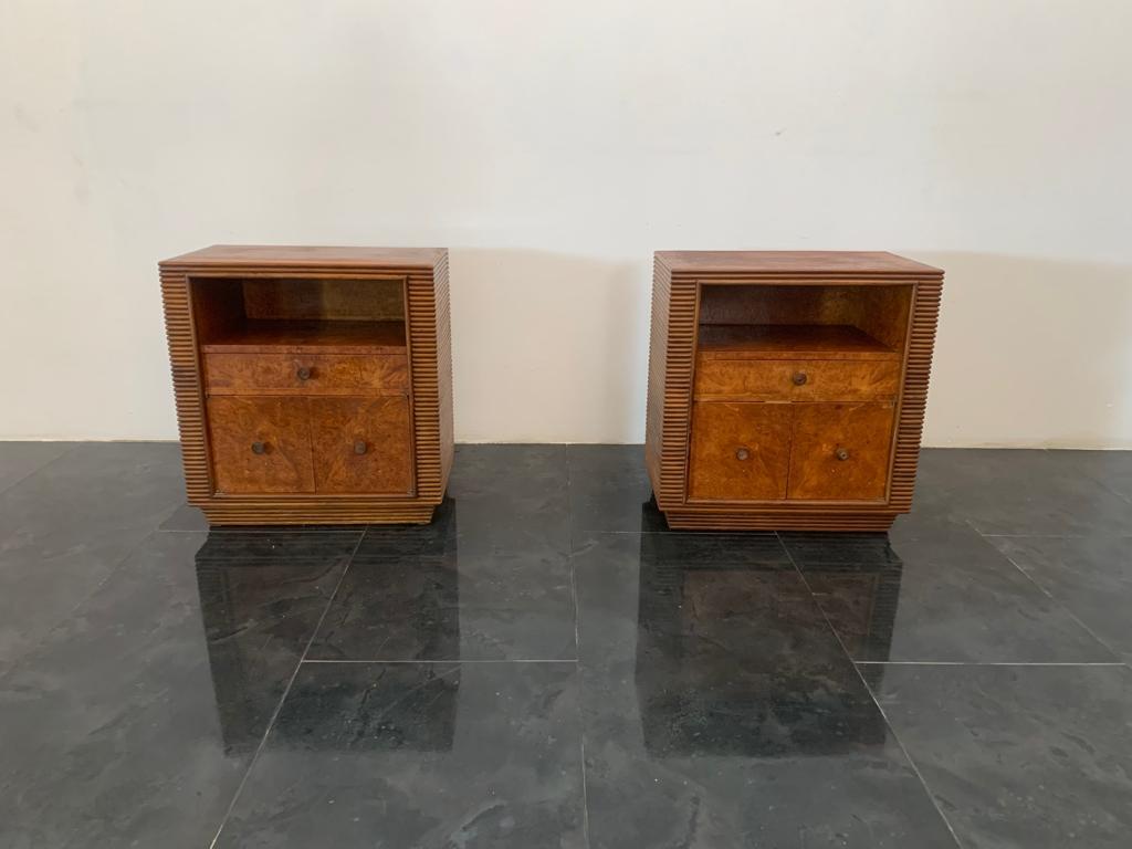 Pair of bedside tables in the style of Pier Luigi Colli, 1940s. Splendid pair of generously sized bedside tables in walnut. Cabinetry of remarkable quality, body totally worked in 