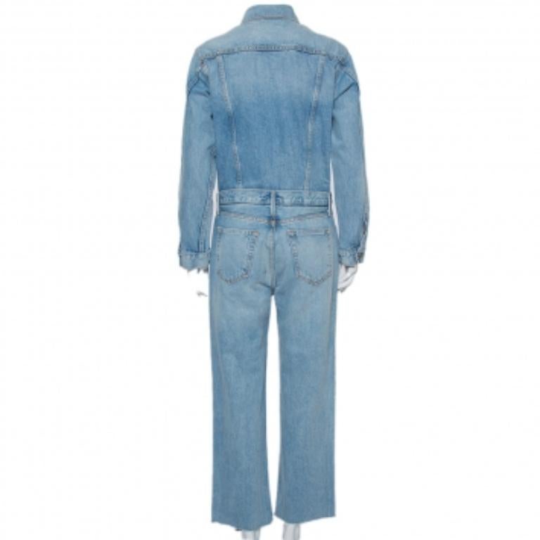 Masterful tailoring and pure designing characterize this outfit from Grlfrnd. This blue jumpsuit redefines your style and is made from denim featuring pockets and belt loops. It has full sleeves, a flattering fit, and a button closure.