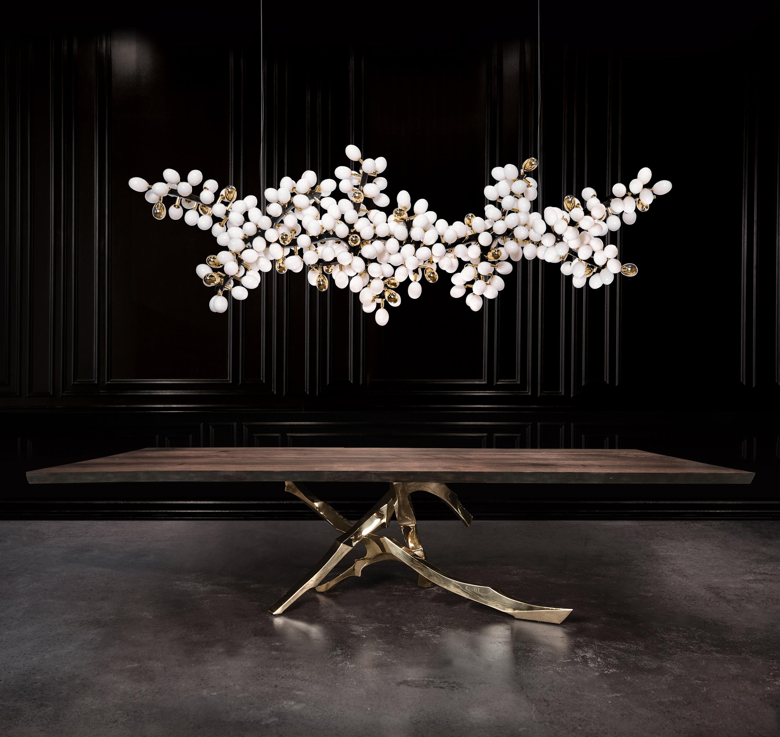 The Grolier Dining Table by Barlas Baylar is a bespoke piece inspired by nature’s organic branches and designed by Barlas Baylar with an architectural approach.   This table is a Hudson classic design.  The hand-made, Cast Bronze base is created