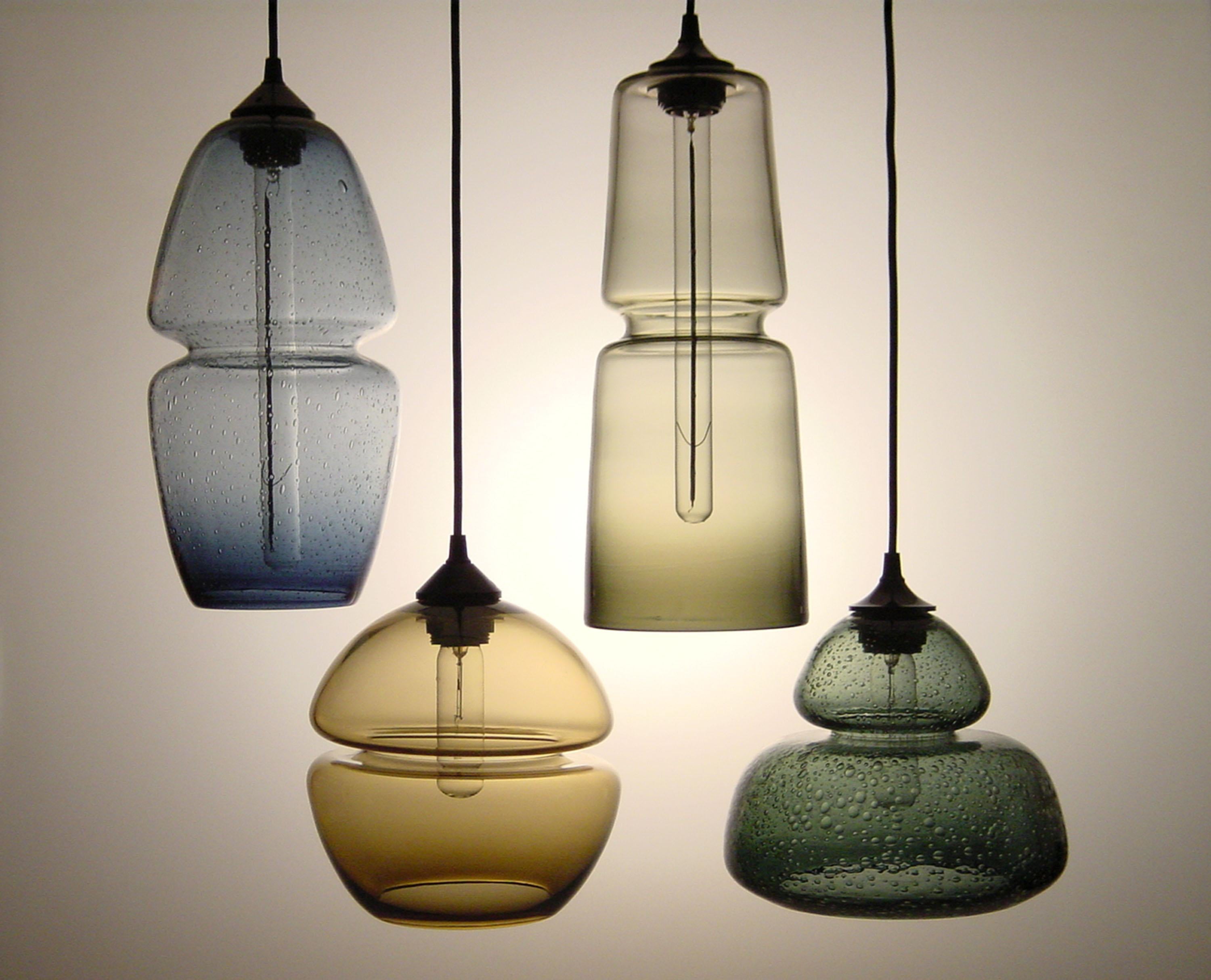 Modern Groove Series Orb Tilt Pendant in Amber, Contemporary Handmade Glass Lighting For Sale