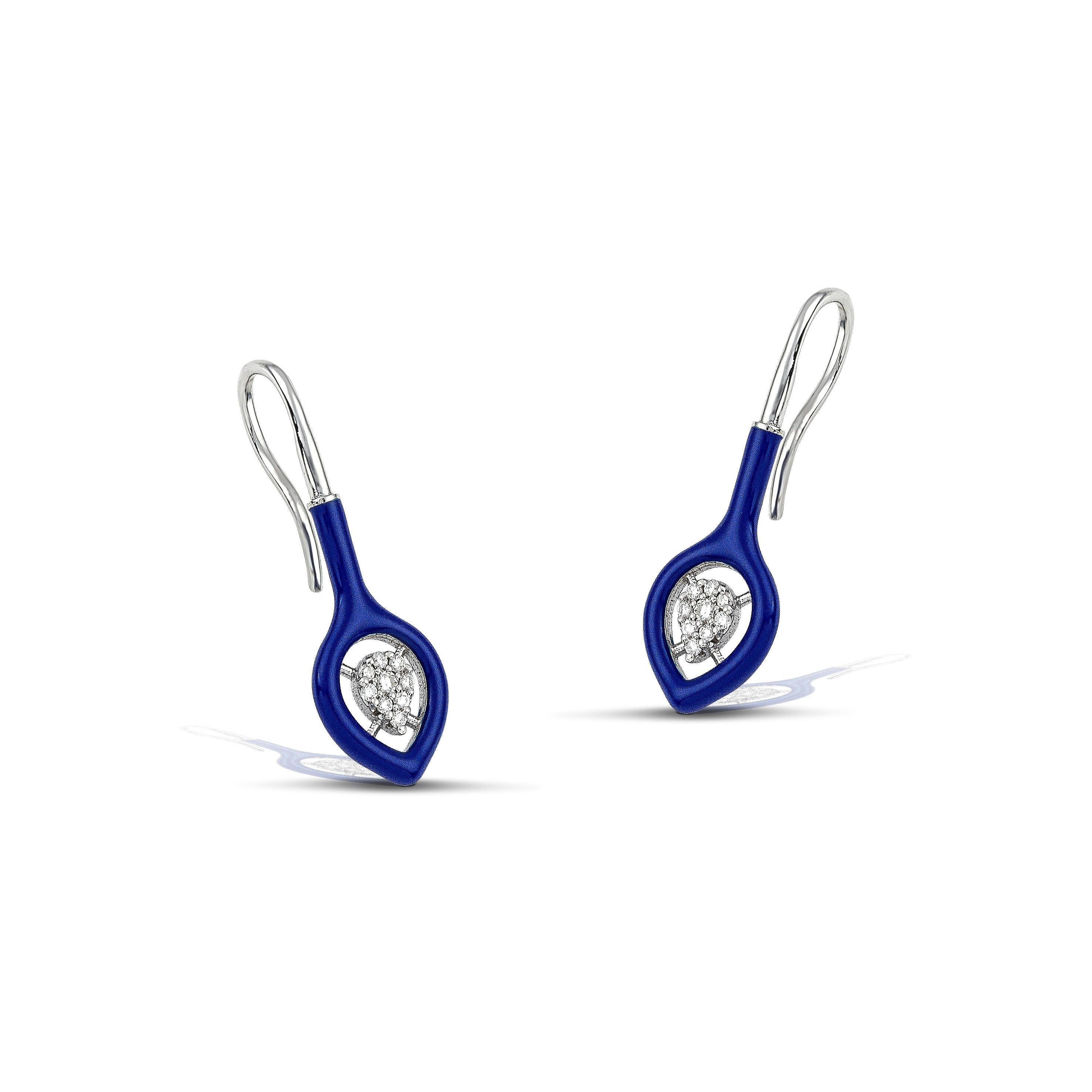 14K gold diamond earrings with a bold navy colour accent, the perfect gift for yourself or a loved one.
100% Recycled 14 K White Gold
Diamonds
Navy Enamel
Size: 3cm/1,18 inches
Inspiration: In the arts, maximalism, a reaction against minimalism, is