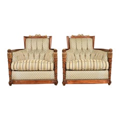 Grosfeld House French Regency Louis XVI Carved Walnut Bergere Armchairs, Pair