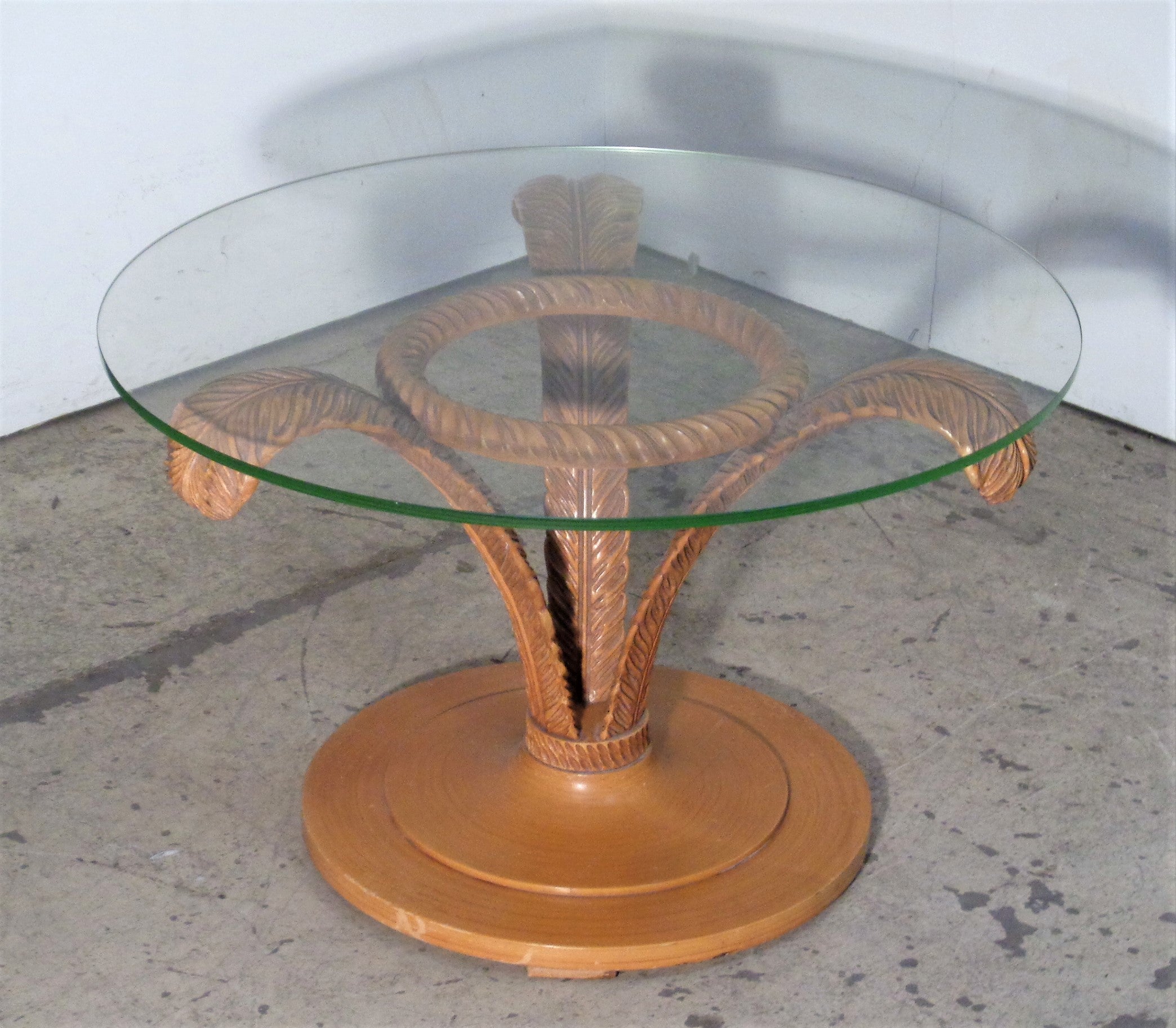 Grosfeld House carved wood plume table with original glazed finish, circa 1940. 29 1/2