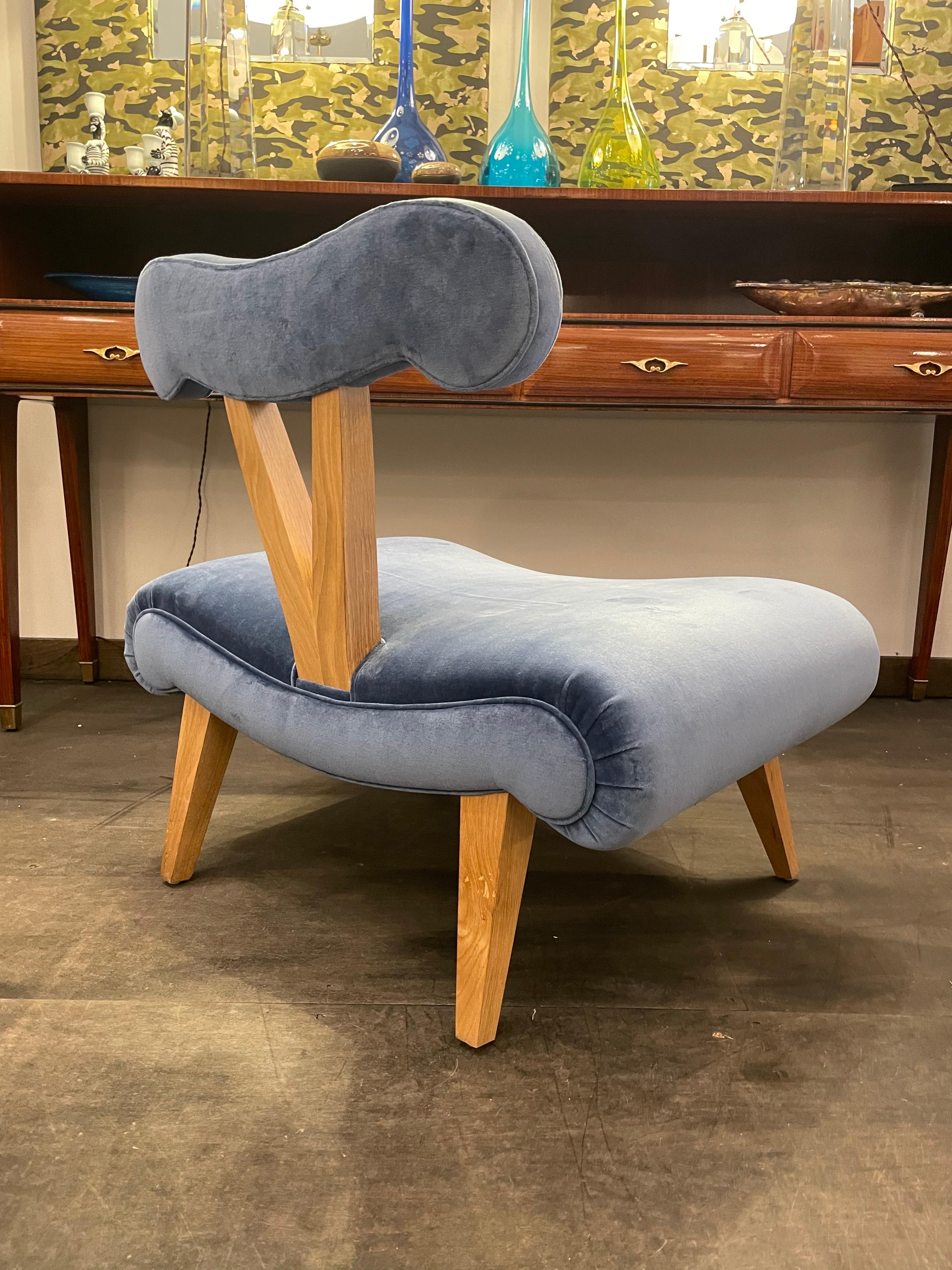 We have 4 of thee iconic Grosfeld House slipper chairs in the Hollywood Regency style, made later than the 1940's. In pristine, almost never used condition, in 4 different velvet colors, making a whimsical grouping. Priced and sold individually -