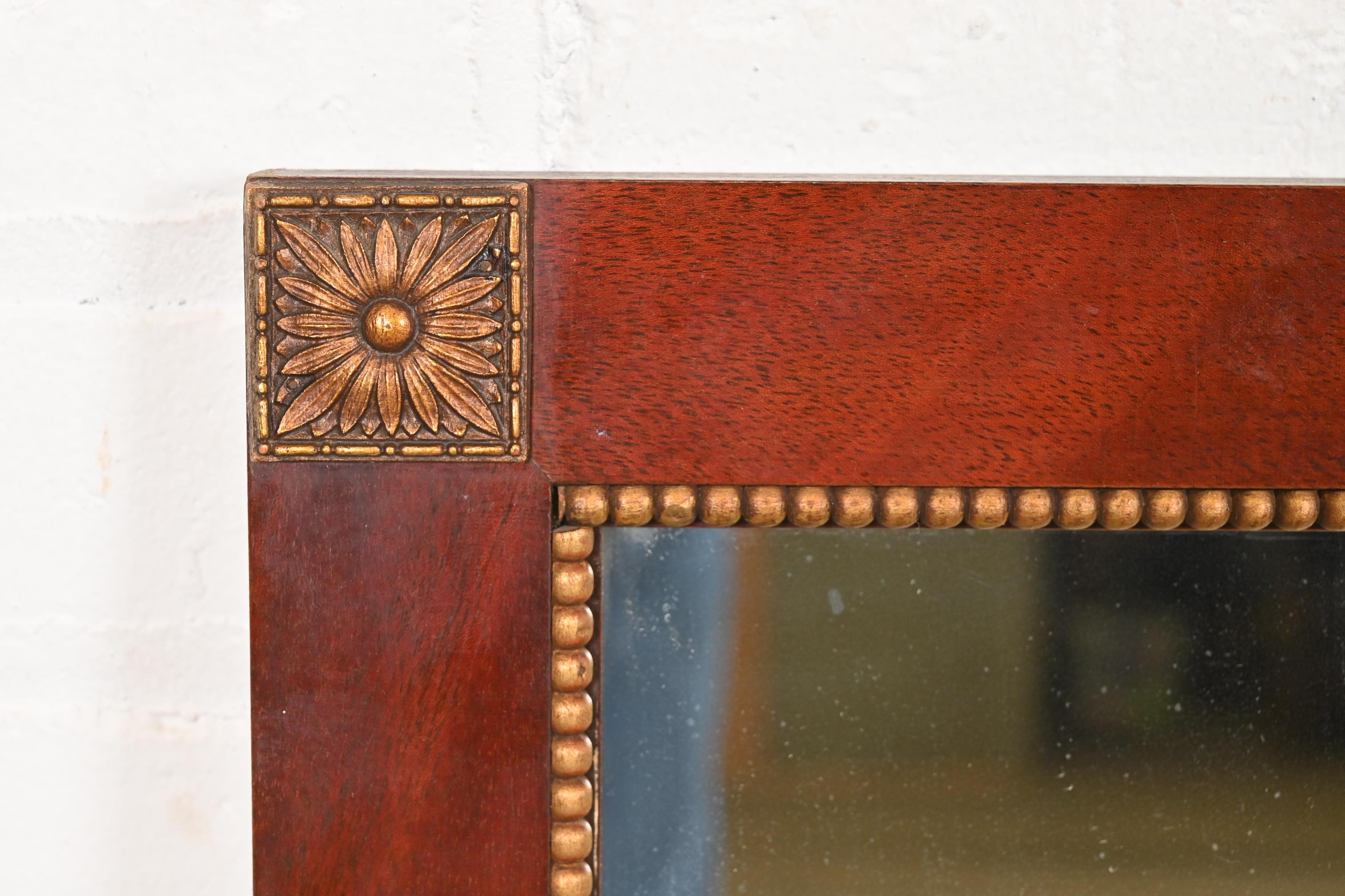 Grosfeld House Style Regency Mahogany and Giltwood Framed Large Wall Mirror In Good Condition For Sale In South Bend, IN