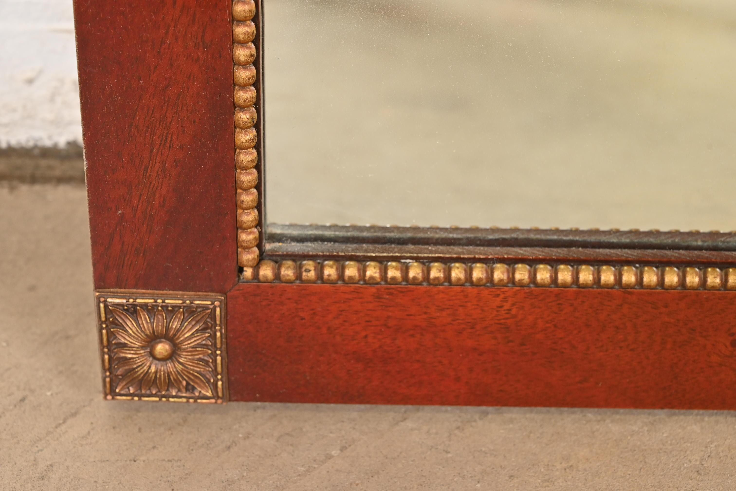Mid-20th Century Grosfeld House Style Regency Mahogany and Giltwood Framed Large Wall Mirror For Sale
