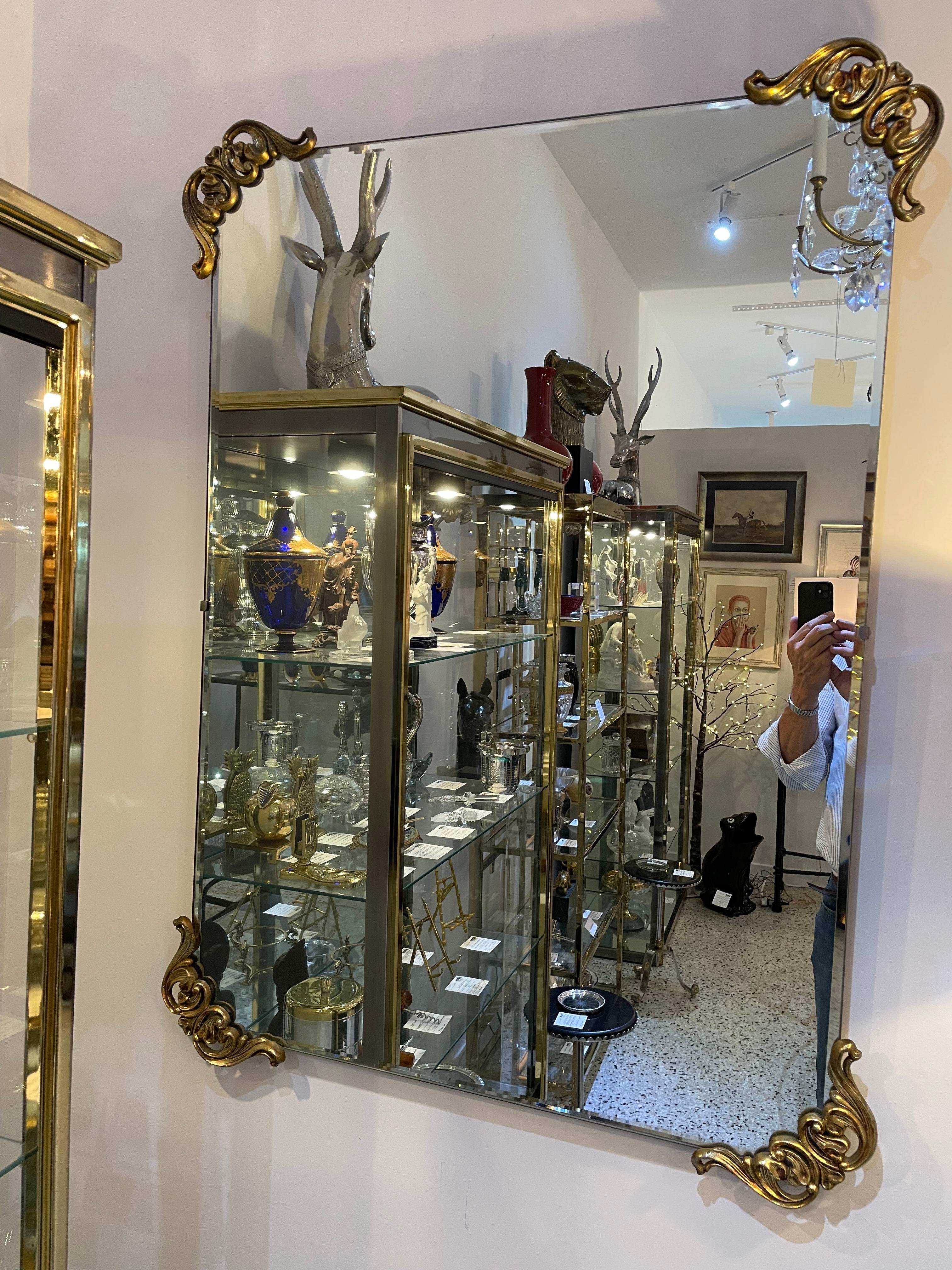 This stylish and chic mirror is very much in the manner of pieces created by Grosfeld House and the Hollywood Regency movement.

Note: The piece retains its original mirror.

Note: The bevel measures 0.38