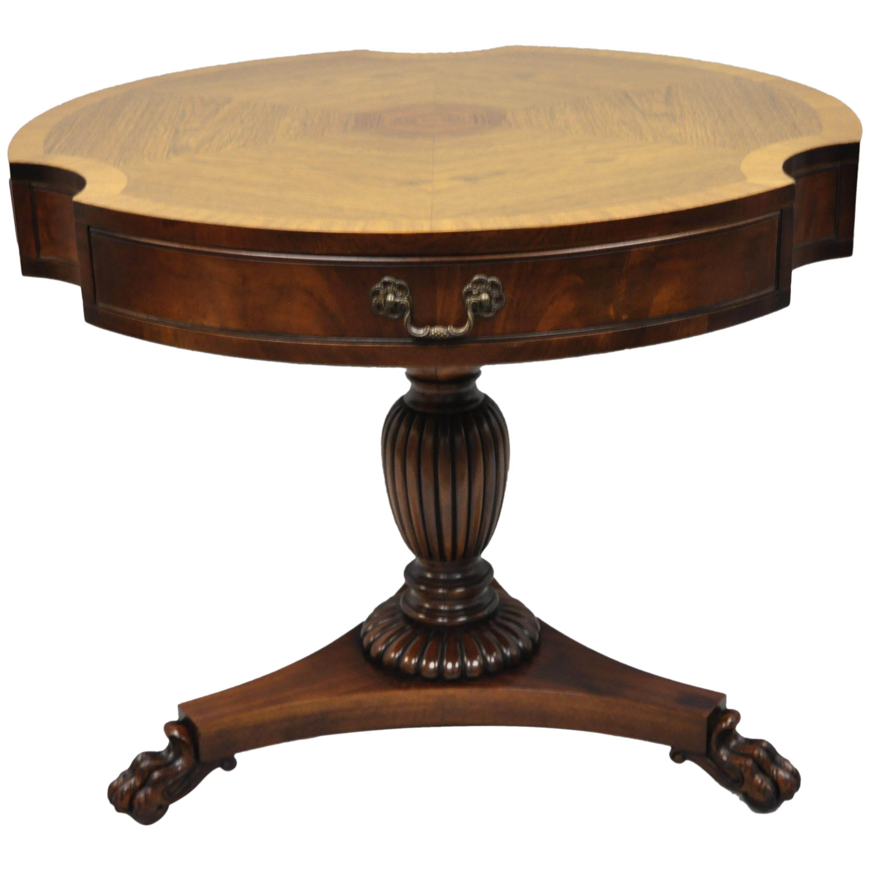 Grosfeld House Mahogany and Rosewood Three Drawer Pedestal Drum Center Table