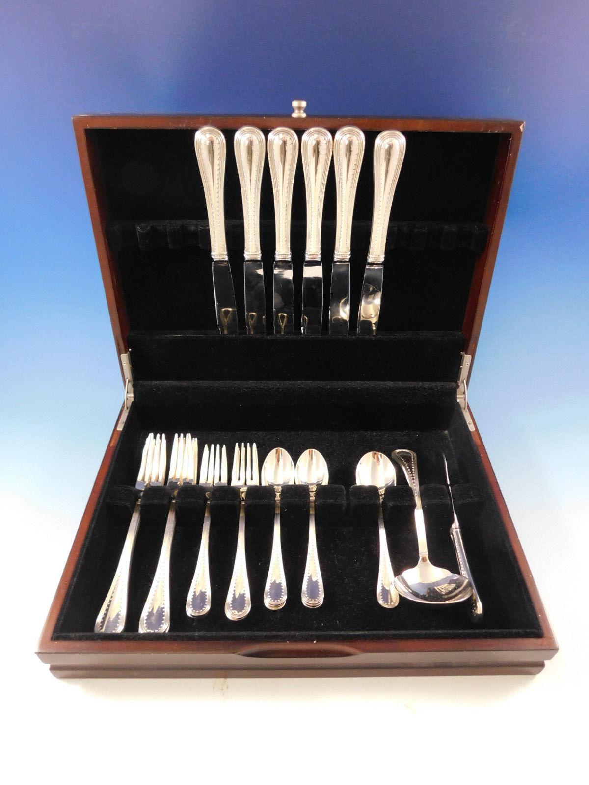 Reflecting the popular Vera Wang dinnerware pattern, Grograin's beading is a modern interpretation of classic design elements. Grosgrain silverware is made in a heavier sterling silver than standard patterns. The pieces are large and