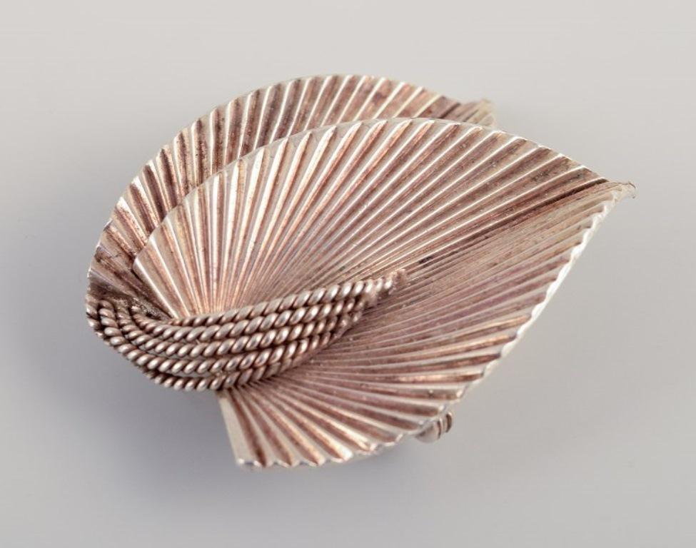 Grosse, Swedish silversmith. 
Sterling silver brooch.
Dated 1958.
In excellent condition.
Marked.
Dimensions: Width 4.0 cm x Height 3.0 cm.