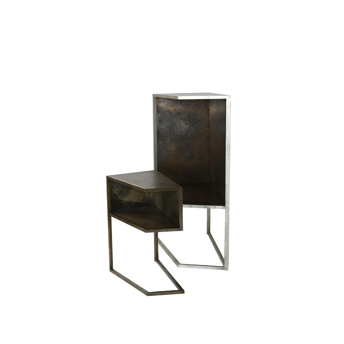 Grosstier is a modern Industrial studio crafted side cabinet with copper plated steel framed varnished wood structure, and hand silvered antiqued mirror on its interior wall . Displayed along side the Kleintier nightstand table, its smaller