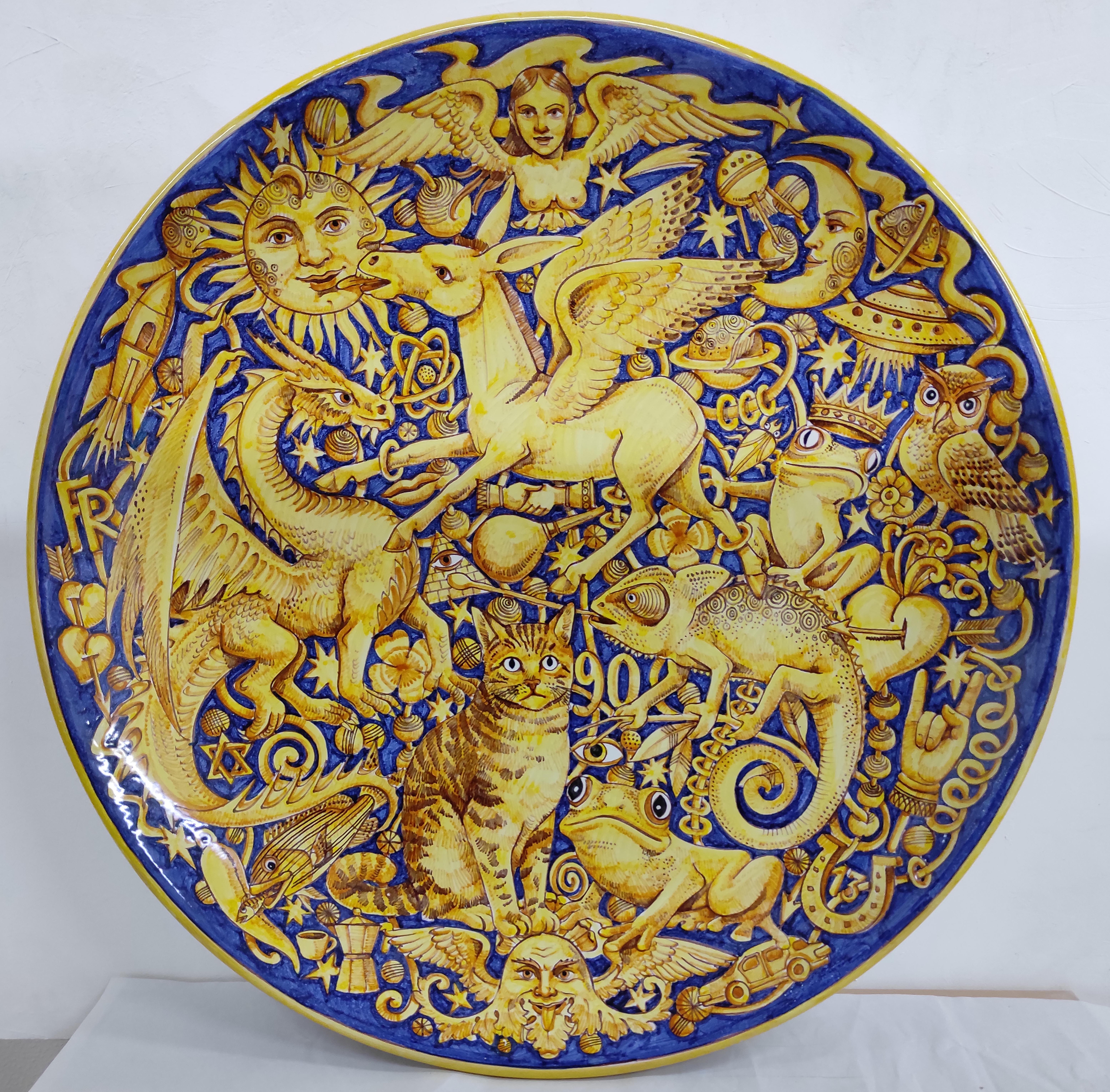 Francesco Raimondi, Grotesque plate, 2020 glazed earthenware 60cm diameter - hand painted, unique piece 

Francesco Raimondi was born in 1959 in Vietri sul Mare on the Amalfi coast, where he currently lives and works. A decorative artist by