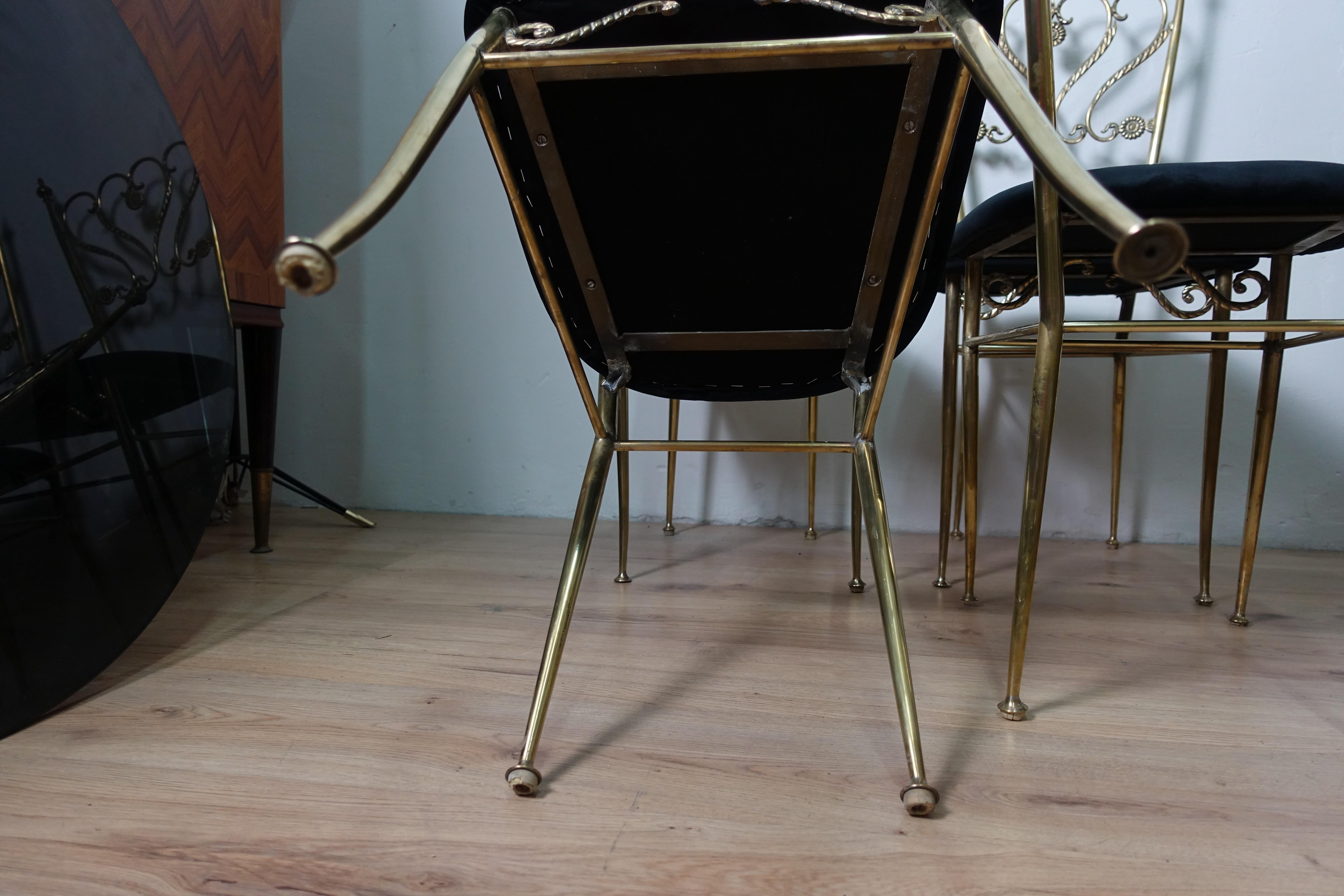 Group 4 chiavarina brass chairs, produced in Italy in 1952, have been polished covered in black fabric.