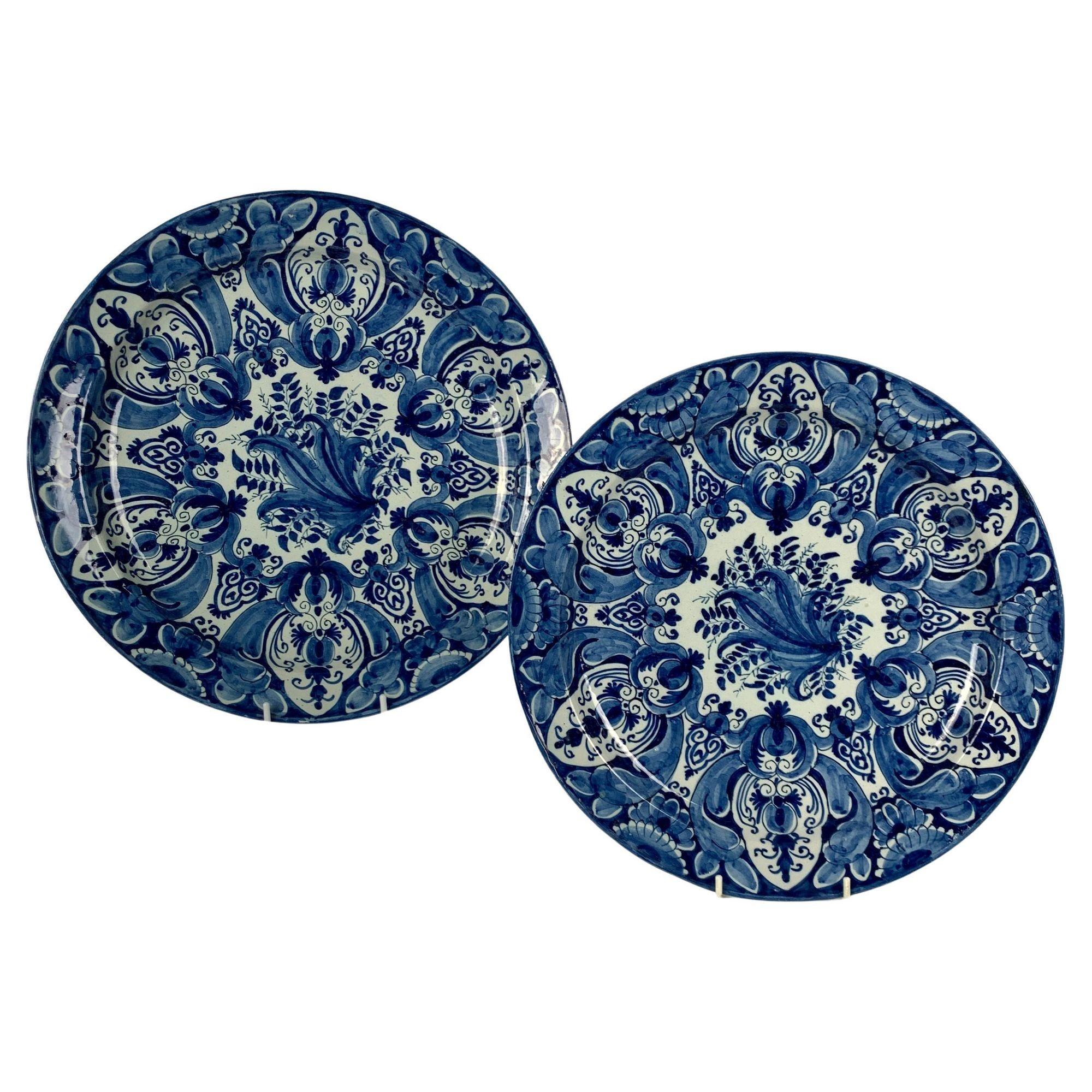 This group of blue and white Delft chargers has beautiful deep cobalt blue coloring.
The white tin glaze is relatively uniform in its color.
The sizes, colors, and designs make a harmonious group.
The chargers were hand-painted between 1760 to