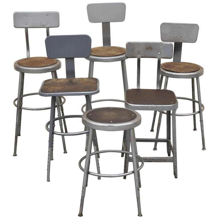 Group Lot of Six Vintage Industrial Steel Metal Drafting Work Stools Chairs  For Sale at 1stDibs