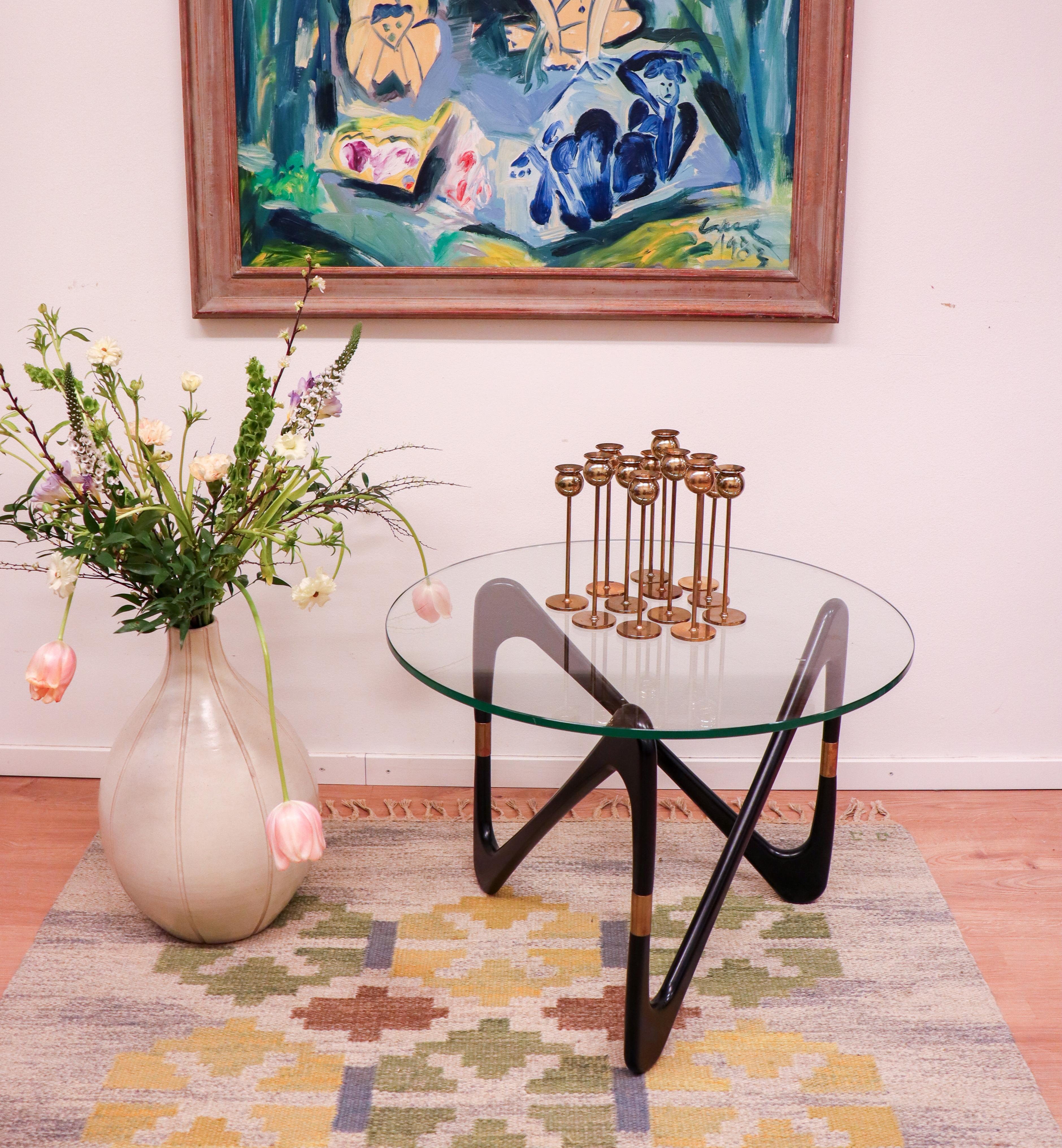 A group of 12 candlesticks by Pierre Forsell, designed and produced at Skultuna in 1980s. The candlesticks comes in three heights, four of each 19.5cm, 21 cm and 23 cm tall. They are all in very good condition excerpt from some minor scratches and
