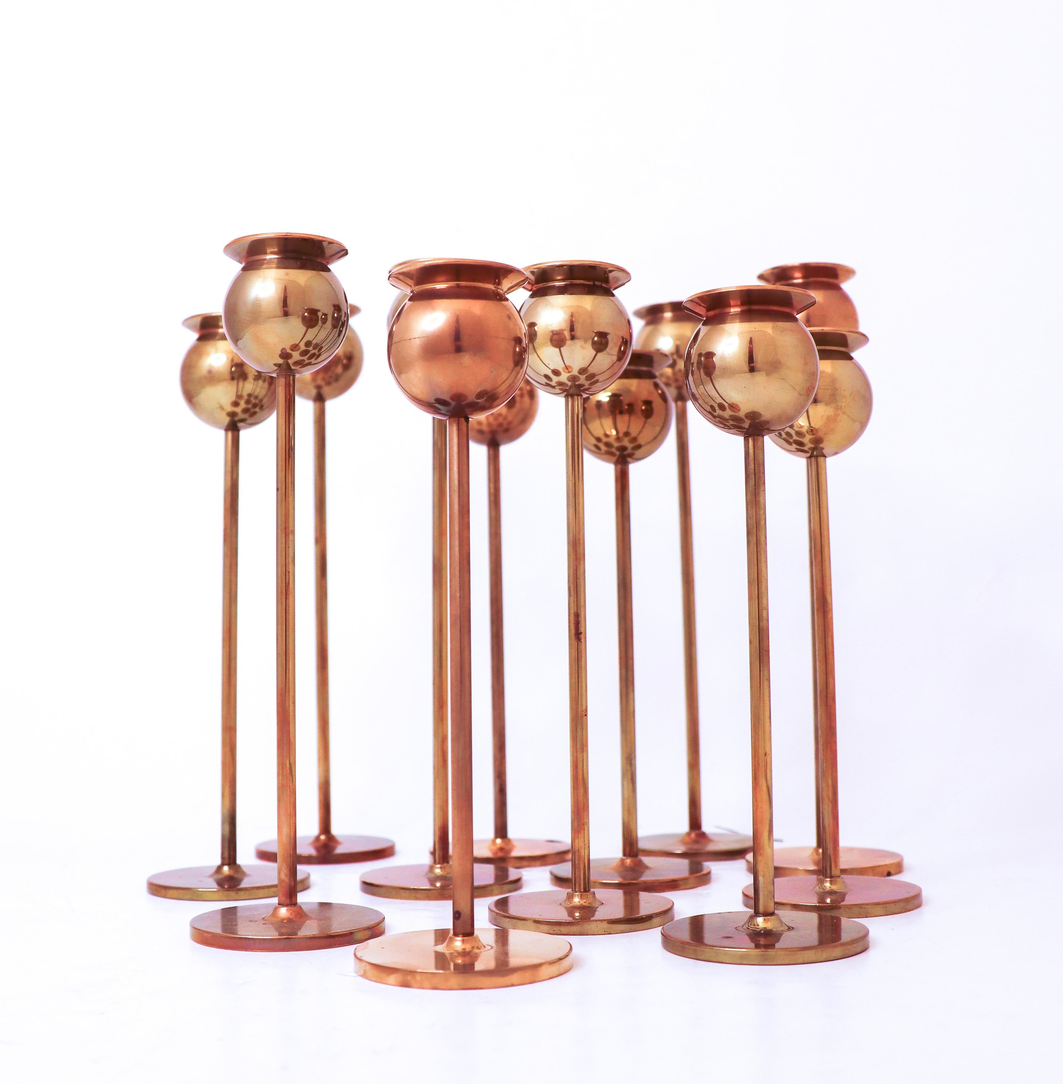 Brass Group of 12 candlestick - 