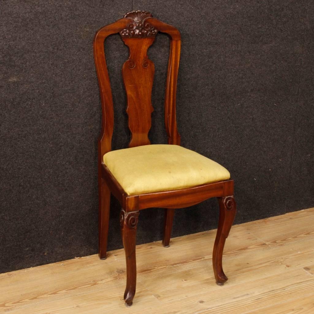 Group of 12 French chairs from the first half of the 20th century. Furniture carved in mahogany wood of excellent quality. Seat upholstered in fabric with different signs of wear, to be replaced. Solid chairs, of excellent stability. Height to seat: