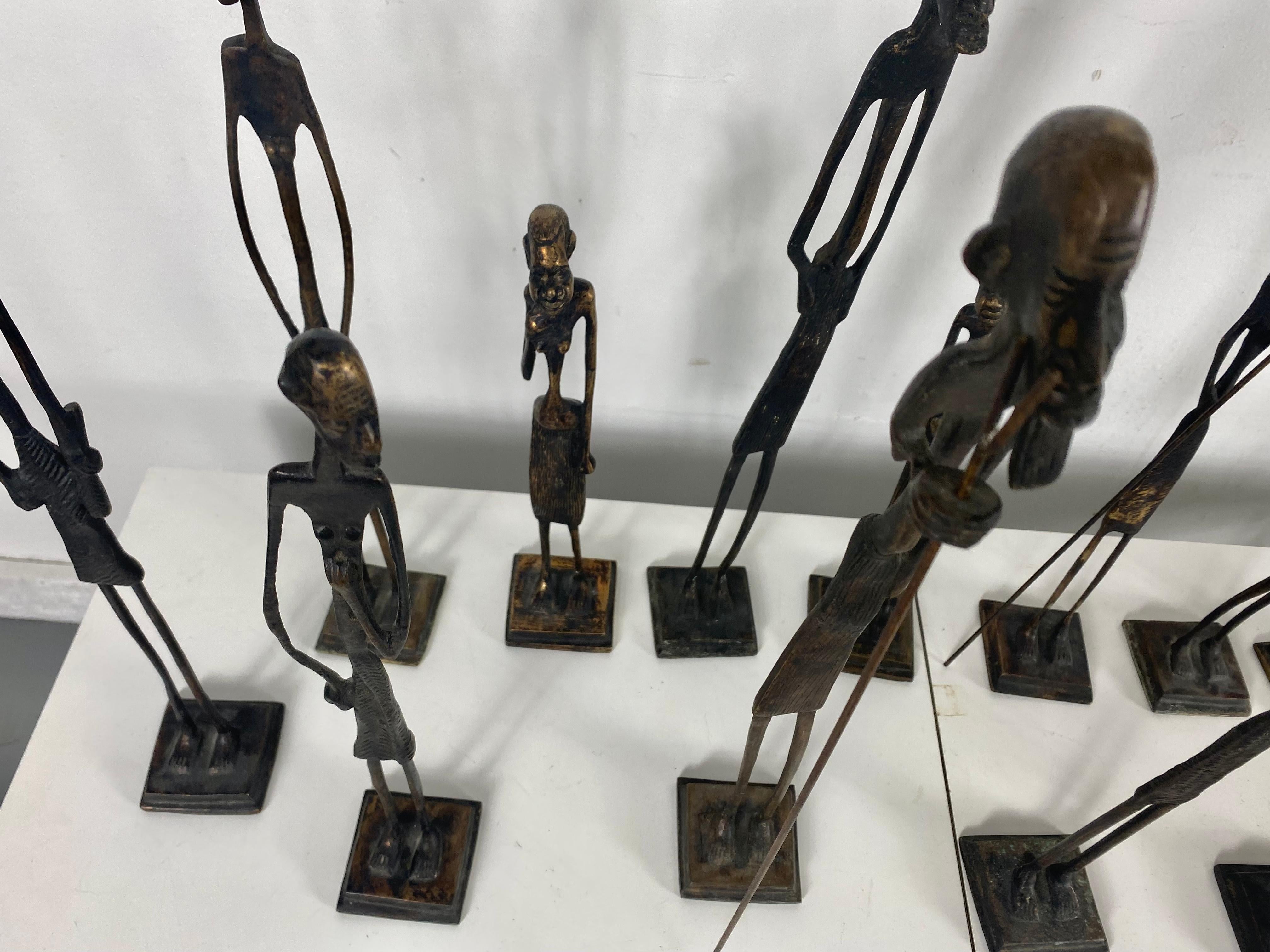 Group of 13 African Bronze 'Brass' Stylized Figures, Figural Sculptures In Excellent Condition In Buffalo, NY