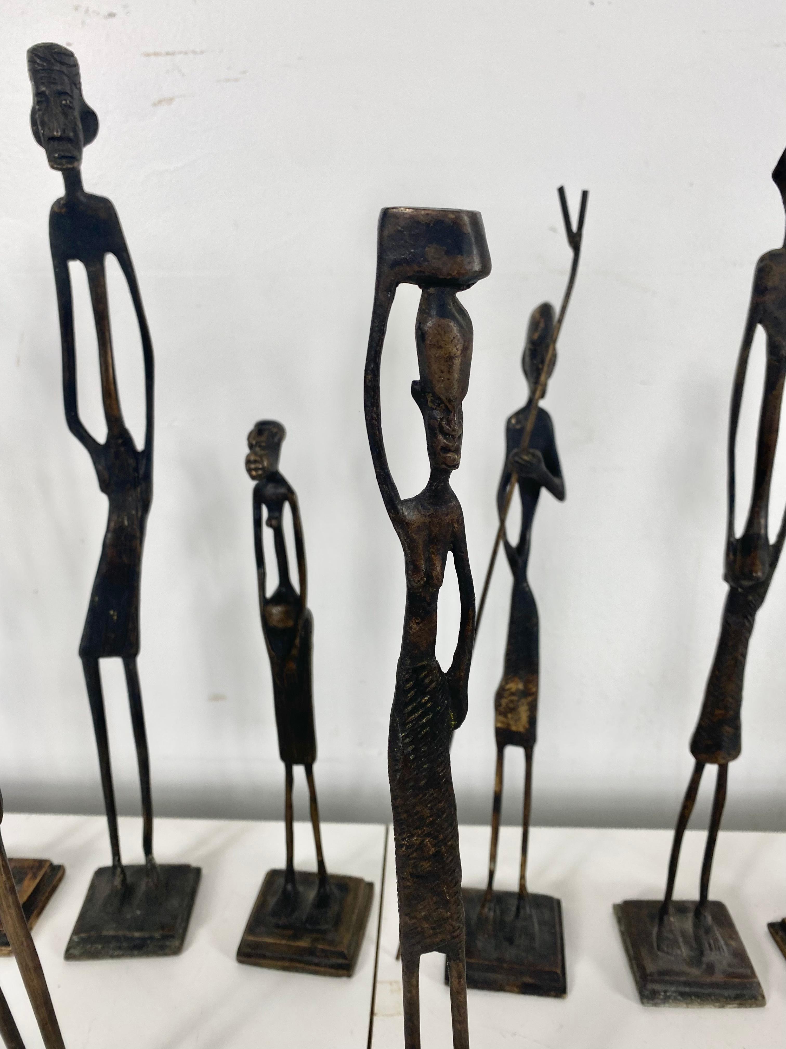 Mid-20th Century Group of 13 African Bronze 'Brass' Stylized Figures, Figural Sculptures