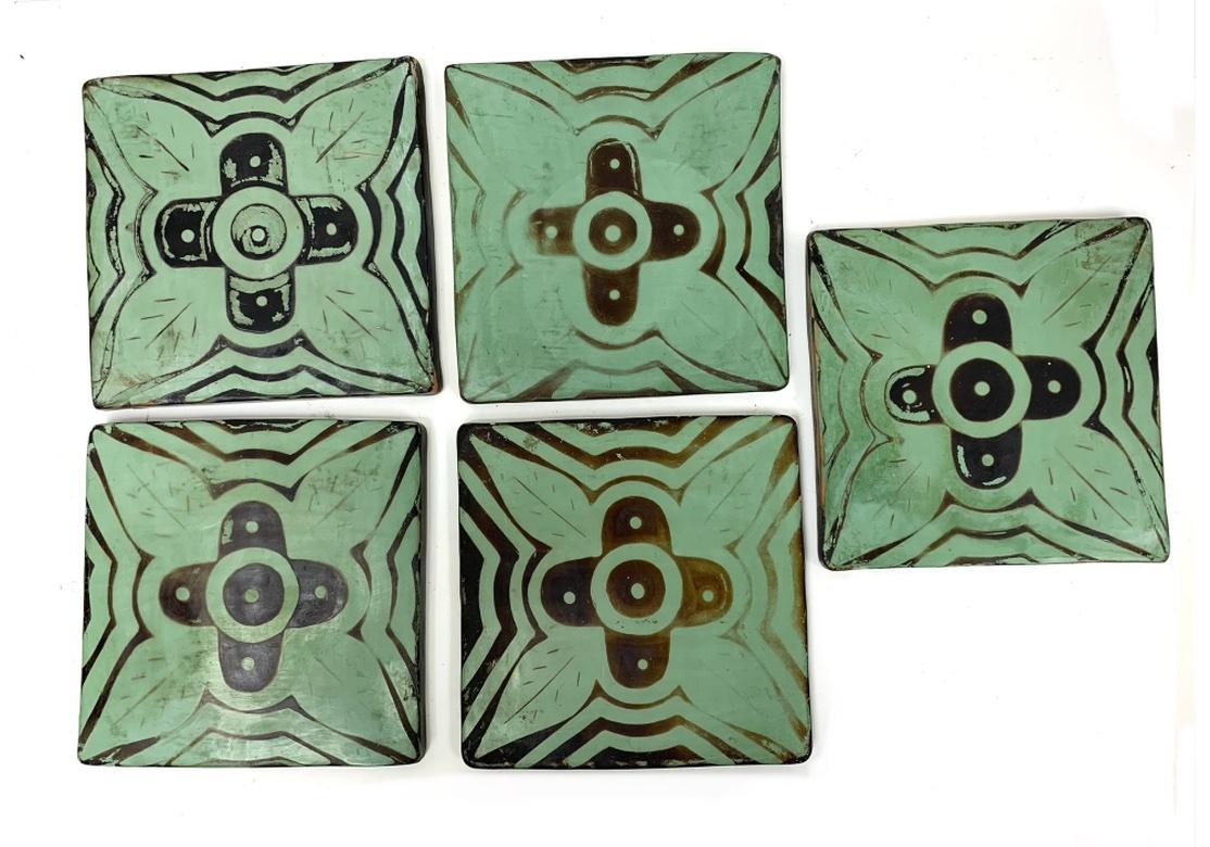 A group of Seventeen timeworn Arts and Crafts style Pottery tiles by Ernesto Sanchez and made in Chulucanas, Peru, a region known for its Pottery for ages. The Tiles are thick with good weight and a pleasing Creamy Green background with a strong