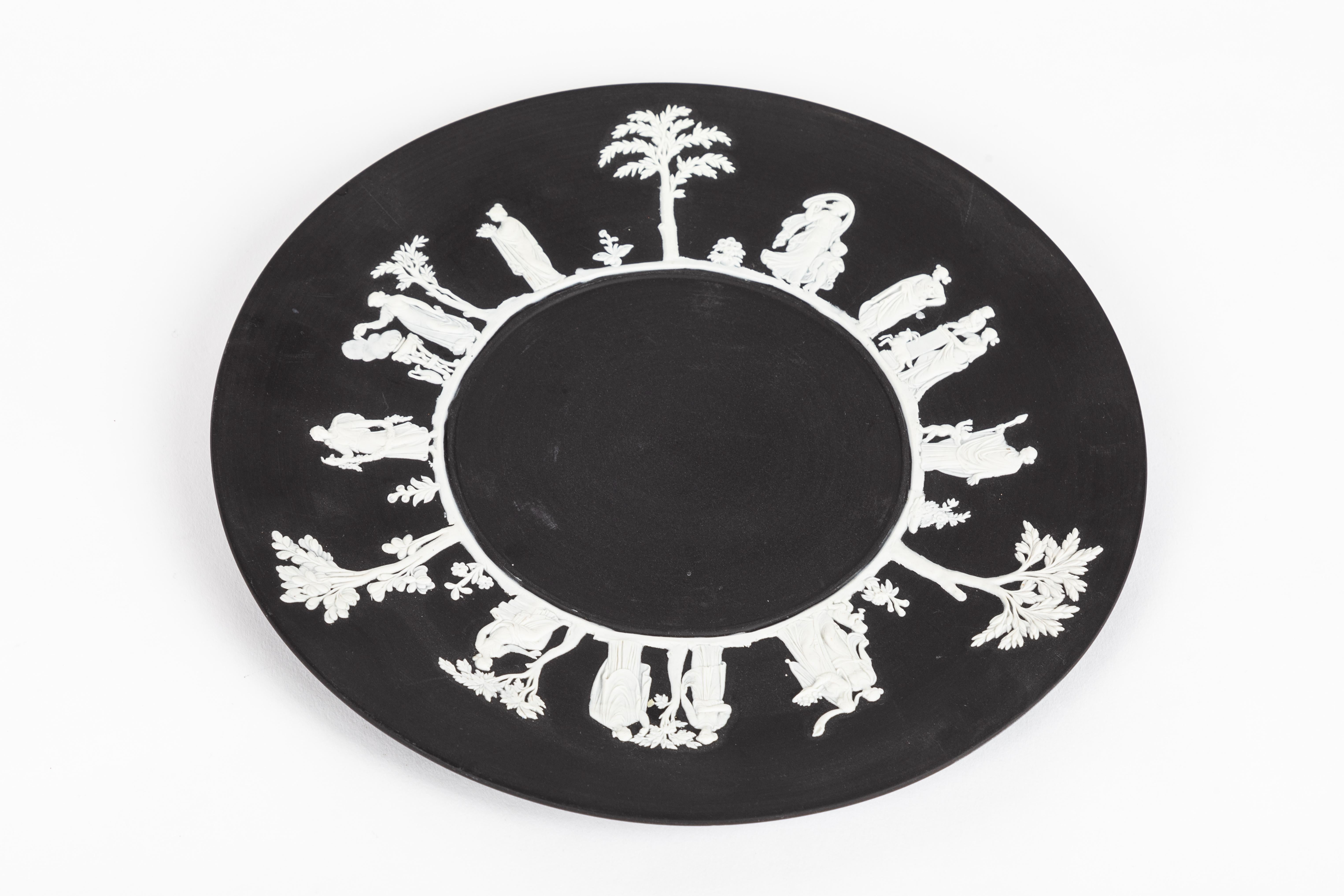A group of 3 black and white antique basalt Wedgwood Jasperware dishes; two 9