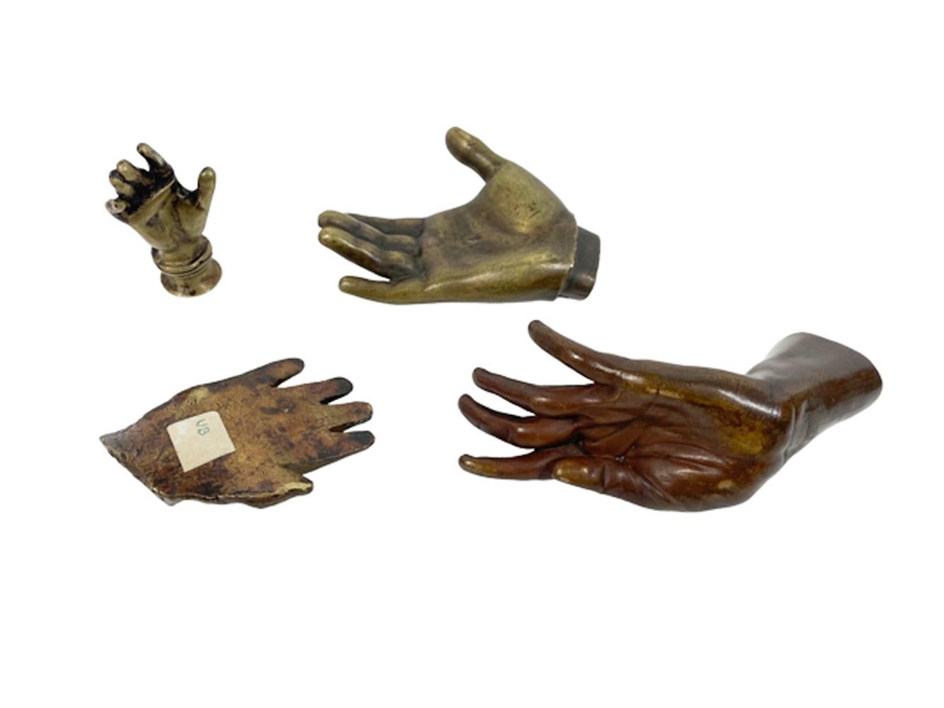 Group of 4 19th/20th Century Models of Hands in Cast Bronze and Brass In Good Condition For Sale In Chapel Hill, NC
