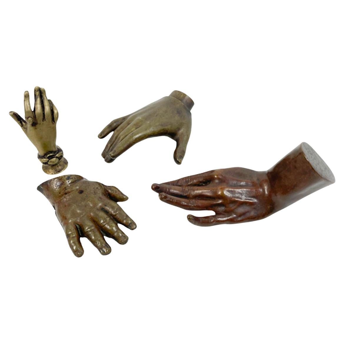 Gruppe von 4 Modellen von Handen aus Bronzeguss und Messing aus dem 19./20. Jahrhundert