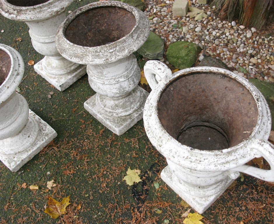 19th Century Group of 4 Cast Iron Regence Style Urns For Sale