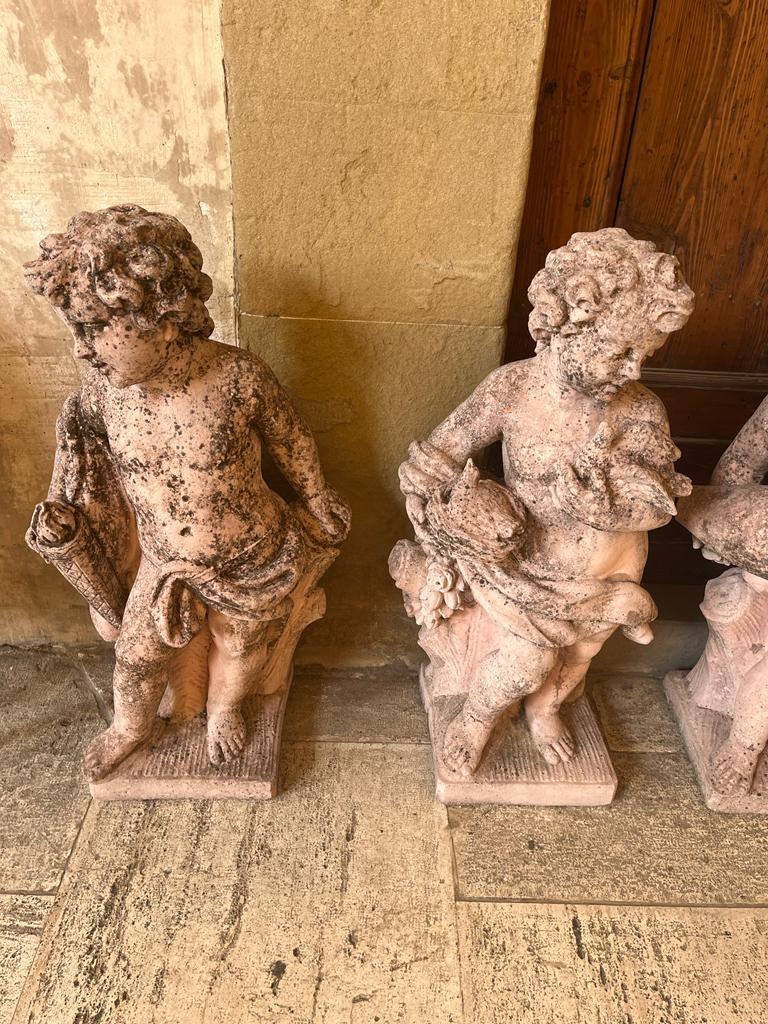 Group of 4 grit Putti depicting the 4 Elements: Sky, Earth, Air and Fire, 1930s In Excellent Condition For Sale In Monselice, PD