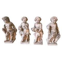 Group of 4 grit Putti depicting the 4 Elements: Sky, Earth, Air and Fire, 1930s