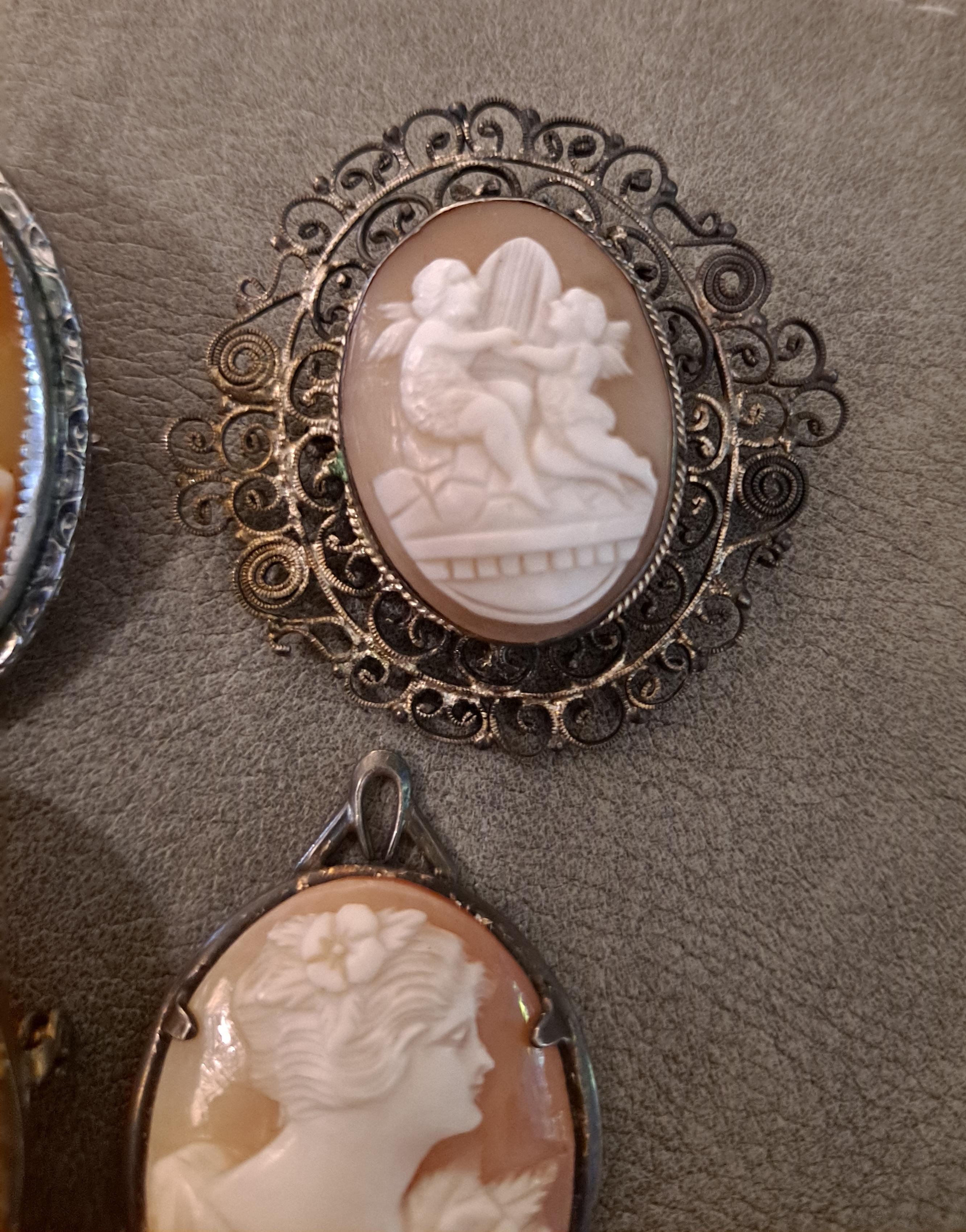 Group of 4 High Relief Cameo Pins/Pendents Carved from Bull Mouth Shell   In Good Condition For Sale In San Francisco, CA
