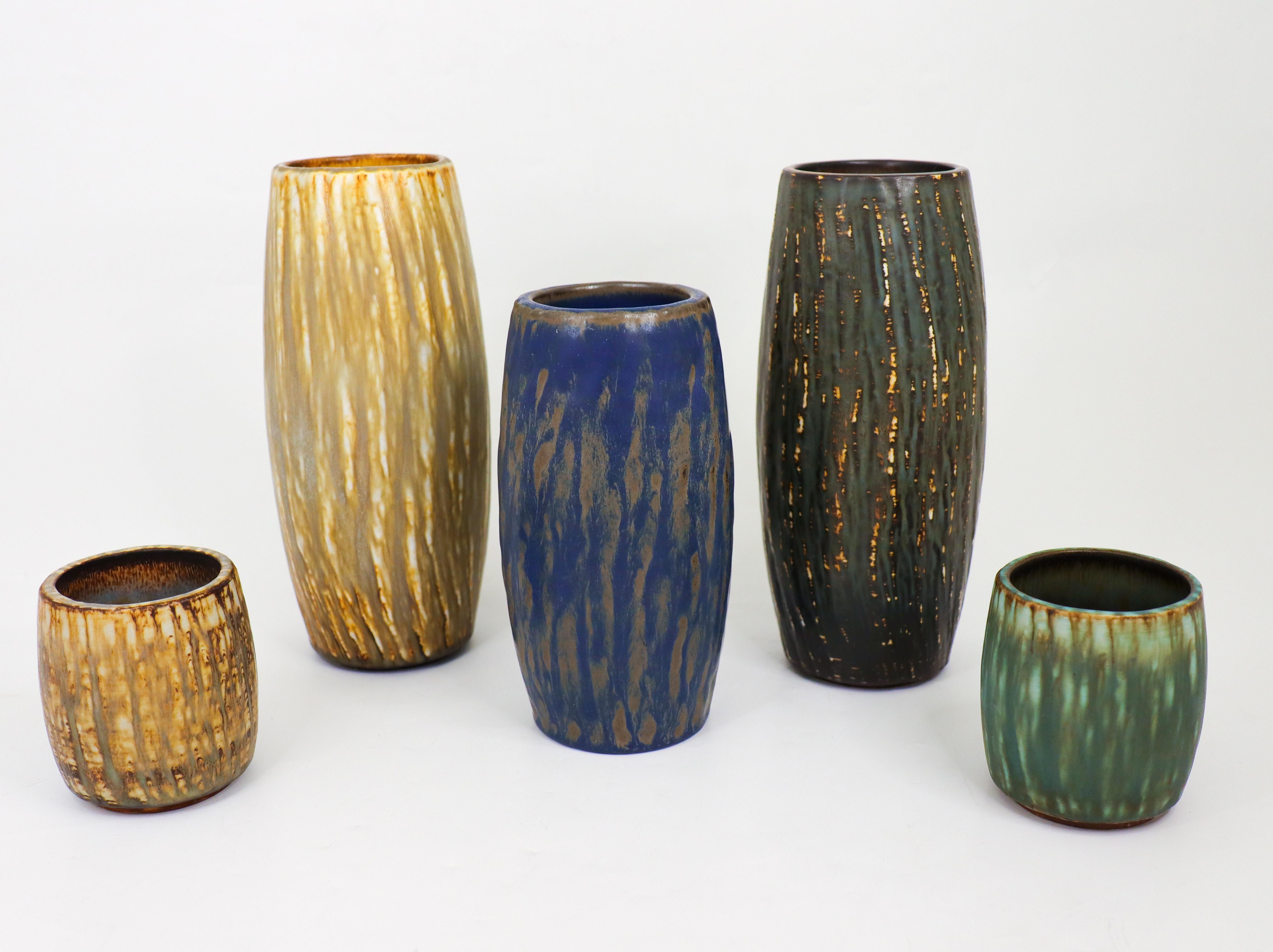A group of five vases of model Rubus designed by Gunnar Nylund at Rörstrand in the 1950s. The vases are between  8.5 - 22 cm high and in excellent condition. Three of the vases are 1st quality and two are 2nd quality. 

Carl-Harry Stålhane is one of
