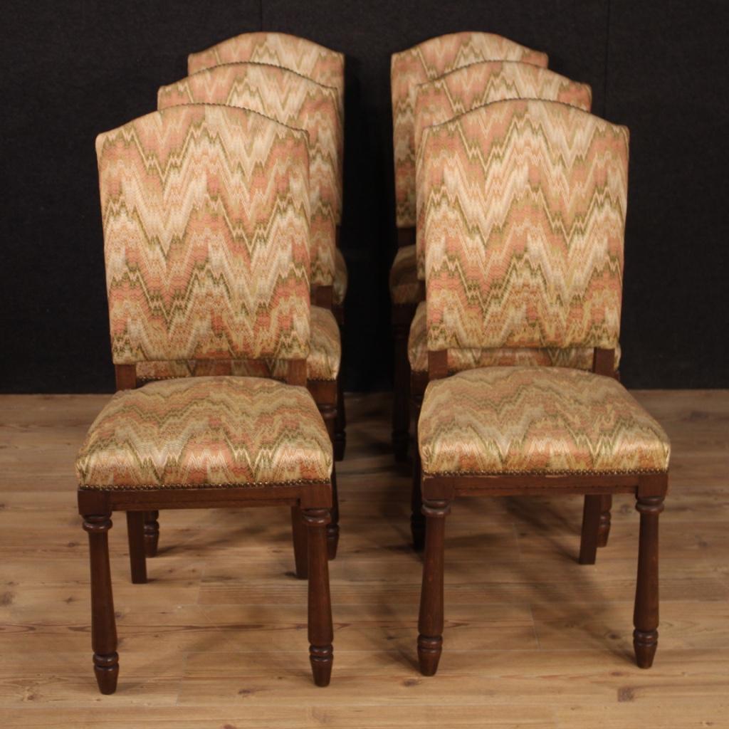 Group of Italian chairs from the 20th century. Furniture carved in wood of beech tree in rustic style with fabric upholstery. Comfortable seating with padding in good condition. Measures: Seat height of 48 cm. Ideal chairs for a living room or
