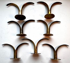 Groupe de (7) bougeoirs en laiton par Ivar Alenius Bjork pour Ystad-Metall, Suède