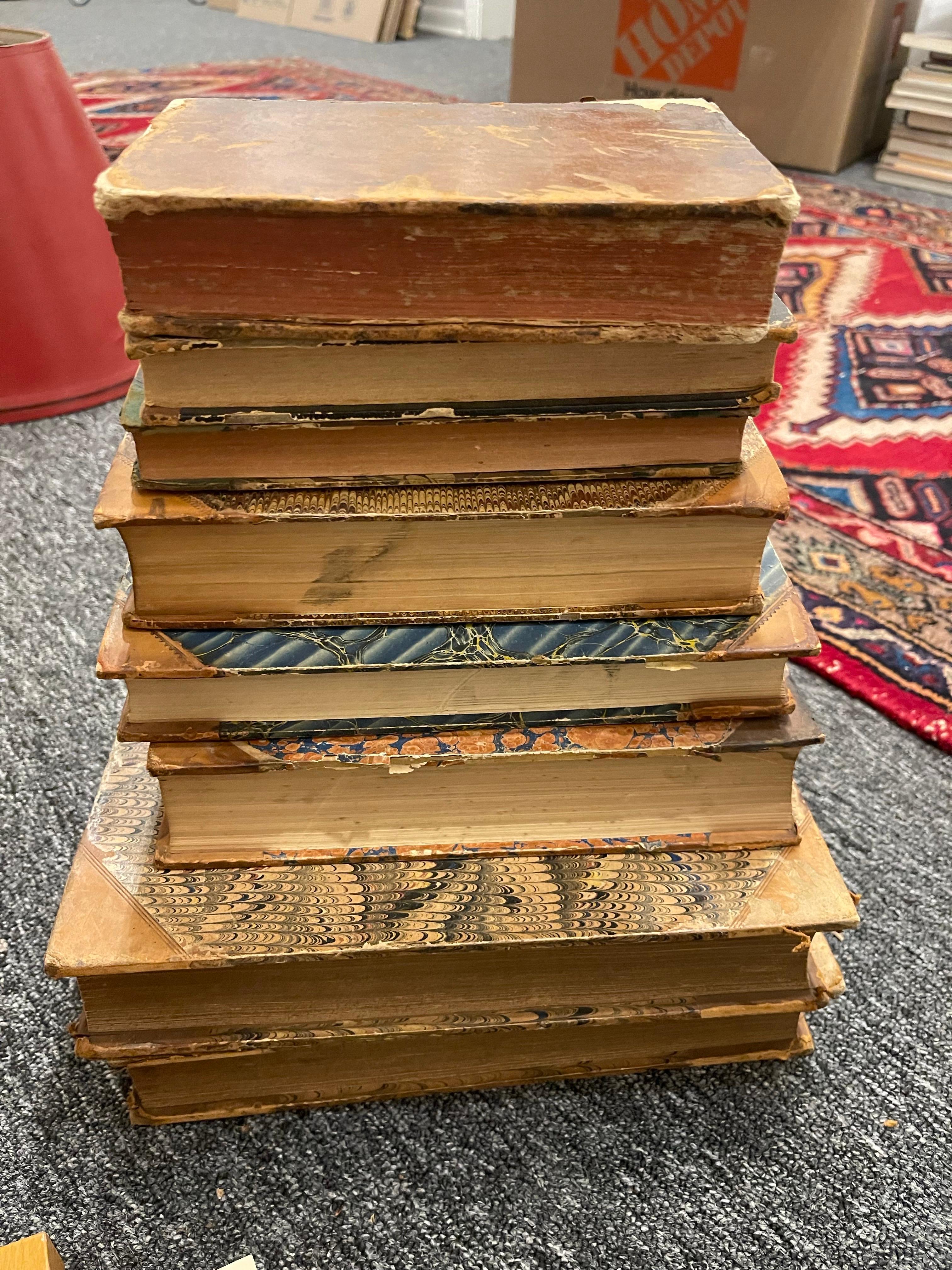 Group of 8 Antique Leather Bound Books, 19th Century.  Books are in different languages and sizes