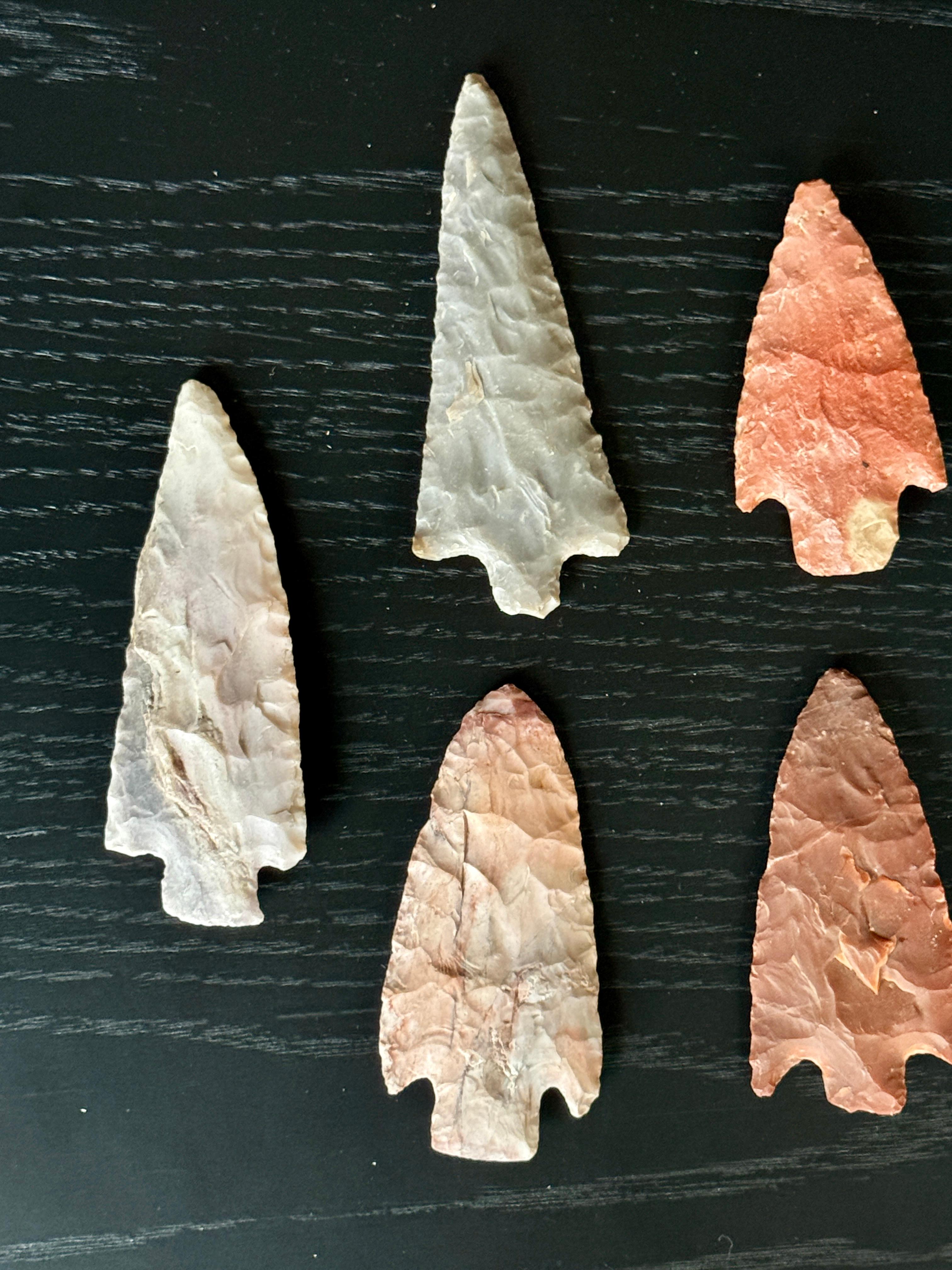 Group of 9 Arrowheads Carved From Various Types of Stone

Largest measures  4.5