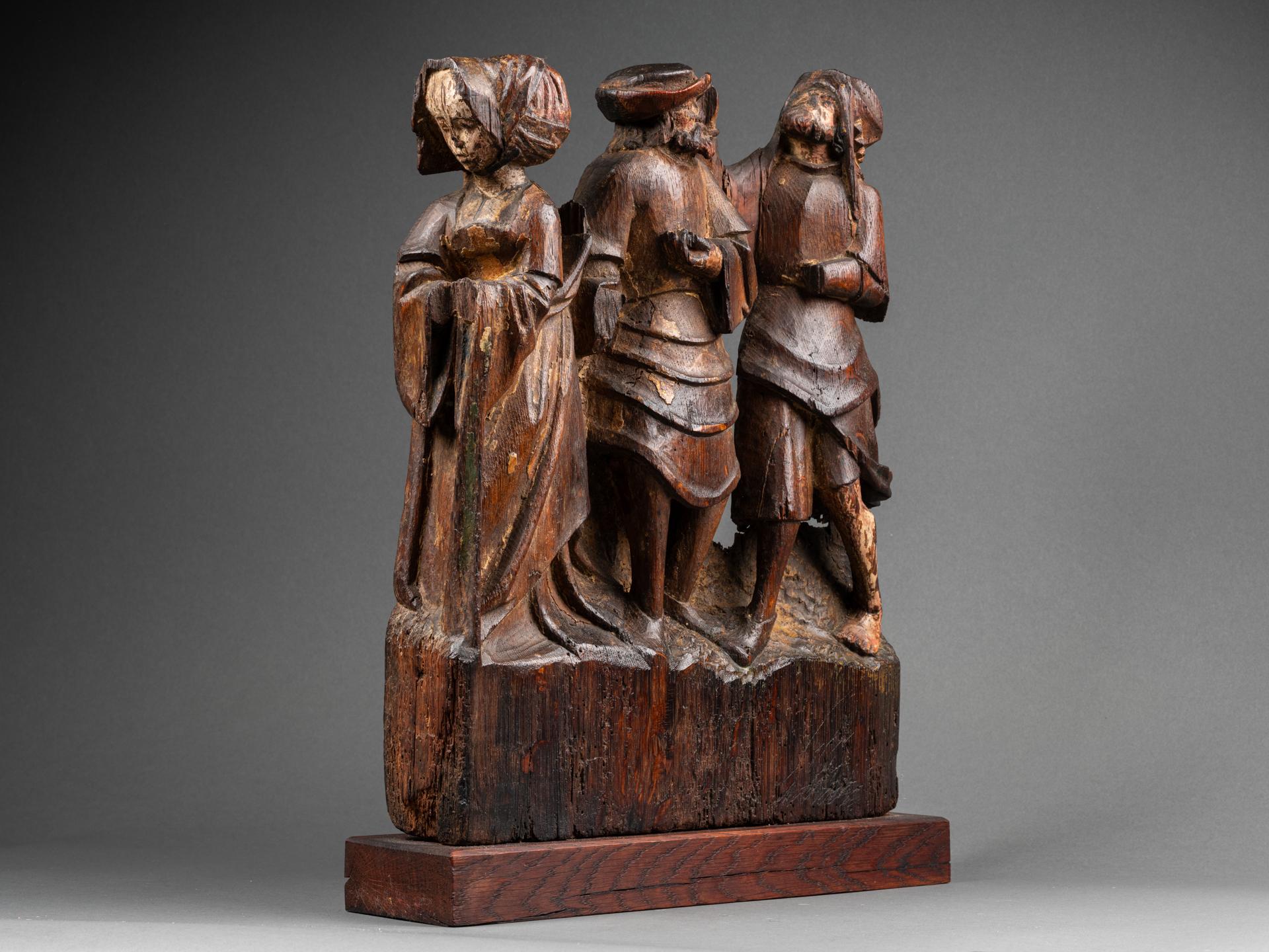 Group of altarpiece representing the life of a Saint, Saint Renualde? 
Engraved by the sign of Antwerp hand on the hat of the central character 
Carved oak, traces of polychromy 
First half of the 16th century 
31.5 x 39 x 6.5 cm

Under the rule of