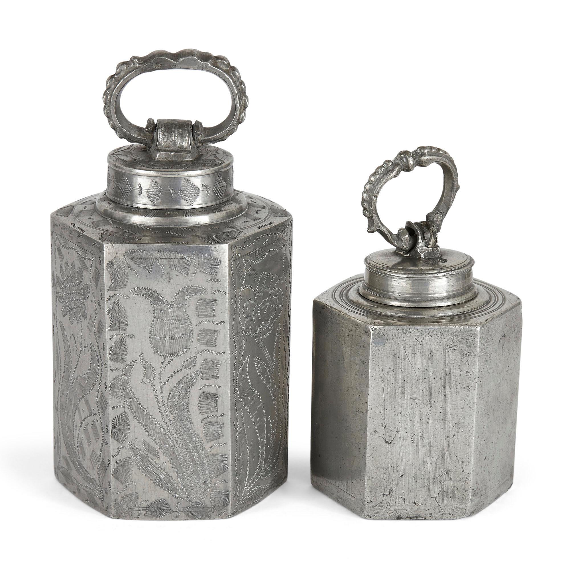 Group of antique German pewter milk jugs
German, 19th century
Measures: Largest: Height 29cm, width 14cm, depth 7cm
Smallest: Height 12cm, width 8cm, depth 8cm

This group is comprised of nine pewter milk jugs, or canisters. The jugs are shaped