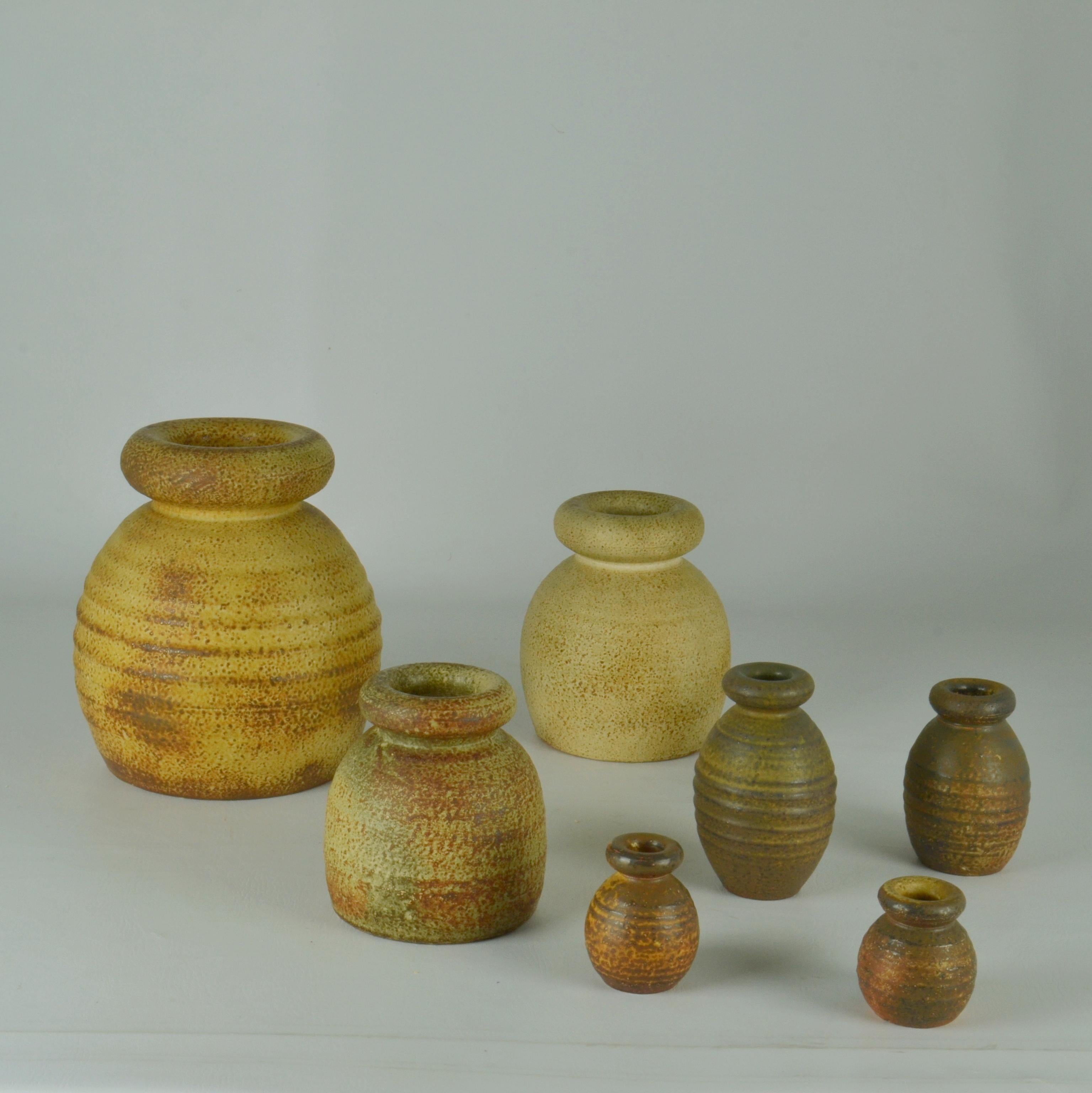 Mid-Century Modern Group of Bulbous Studio Ceramic Vases with Rolled in Earth Tones by Piet Knepper For Sale