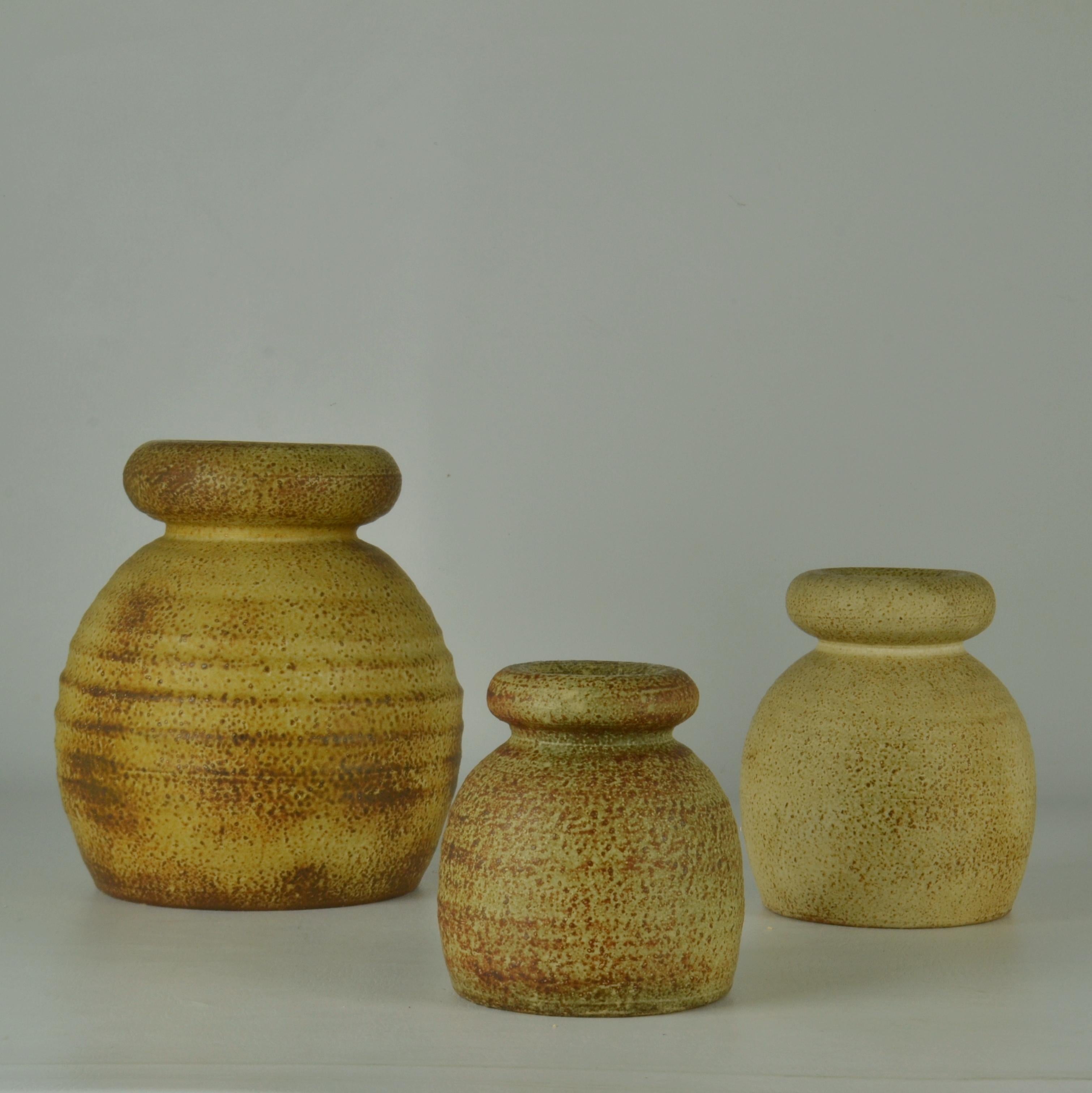 Glazed Group of Bulbous Studio Ceramic Vases with Rolled in Earth Tones by Piet Knepper For Sale