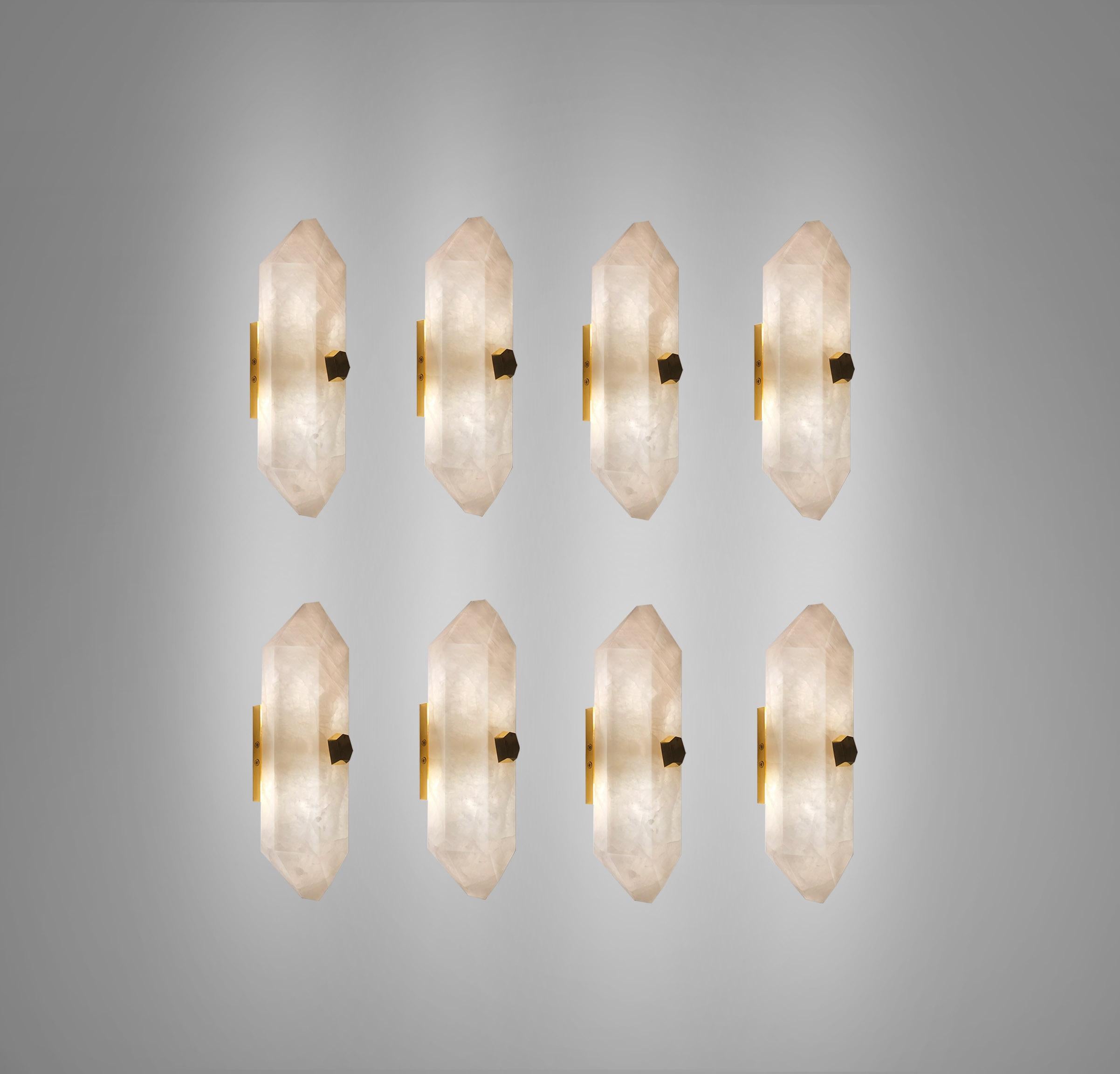 Group of eight finely carved diamond form rock crystal sconces with the polished brass mounts. Each wall sconce installed two sockets, 60 watts max each socket, total 120-watt. Created by Phoenix Gallery NYC.
Custom size, finish, and quantity upon