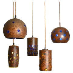 Group of Five Copper and Glass Pendant Lamps by Nanny Still for Raak
