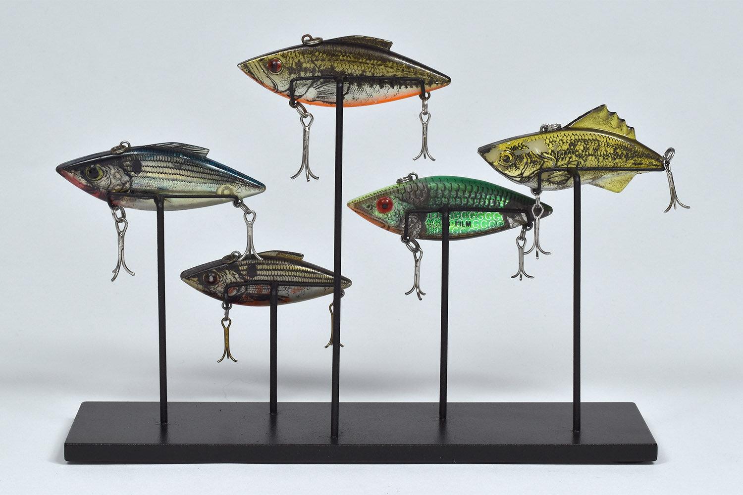 Group of five freshwater fishing lures collected from Lake Tahoe, California.

Part of a large group of lures collected over several years from the bottom of Lake Tahoe by a father and son as competitive sport and summer fun. The age and condition