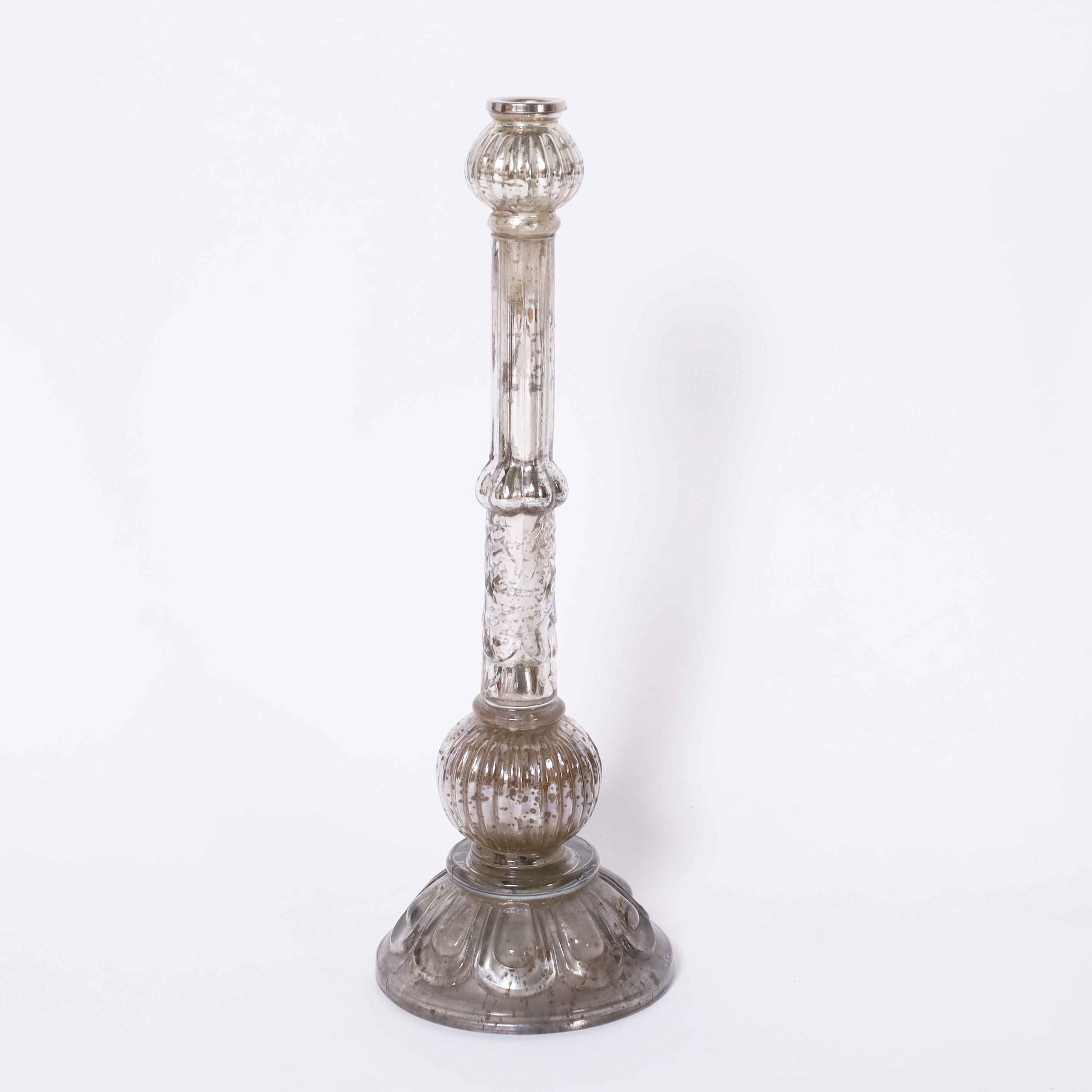 Standout set of four 19th Century English glass candlesticks hand blown and pressed with a reverse mirror style now oxidized to perfection.