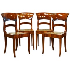 Group of Four Austrian Neoclassical Figured Walnut Side or Dining Chairs